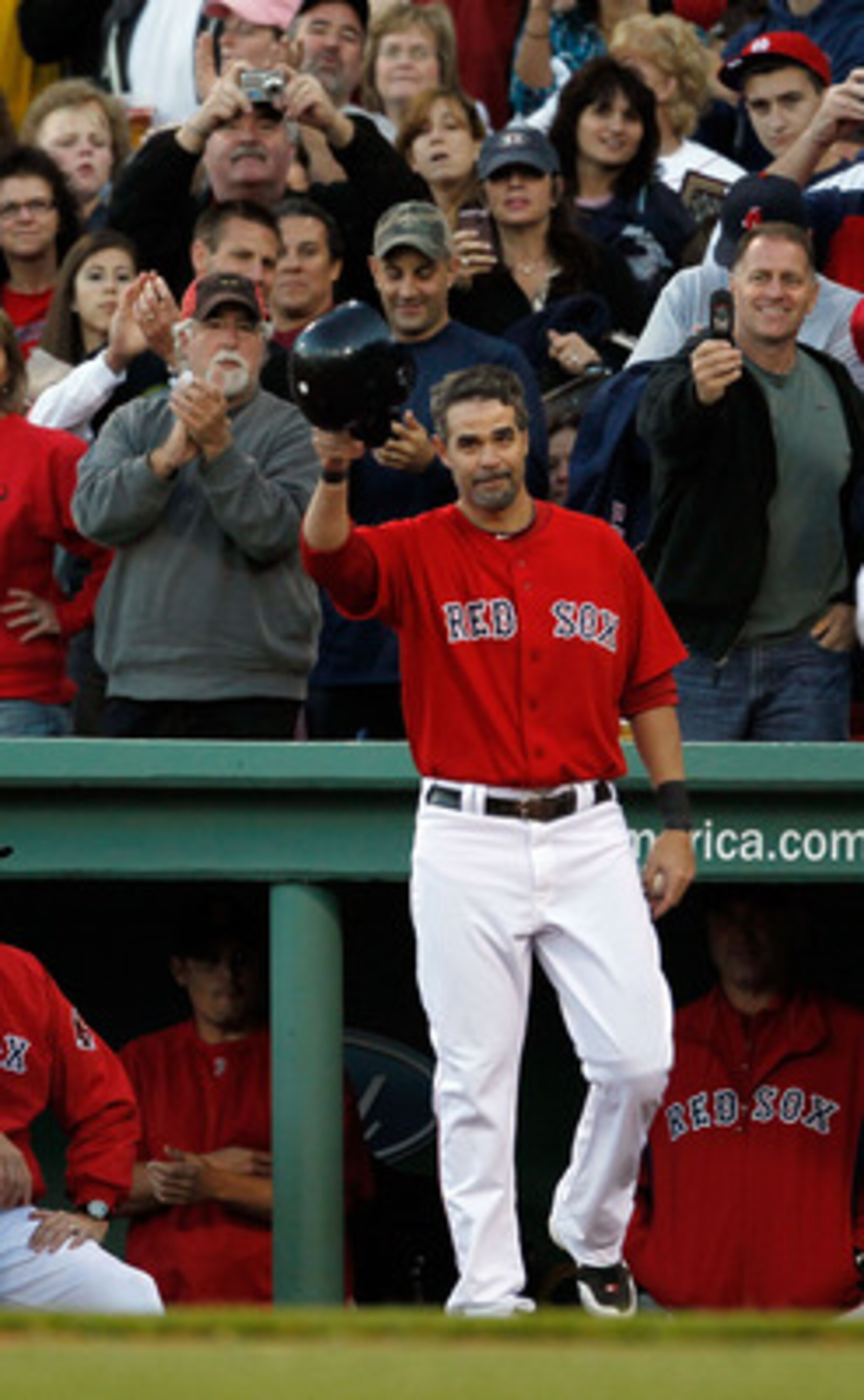 BOSTON - OCTOBER 2:  Mike Lowell #25 of the Boston Red Sox reacts to the applause after he was replaced by a pinch runner in the fifth inning during the first game of a doubleheader against the New York Yankees at Fenway Park October 2, 2010 in Boston, Ma
