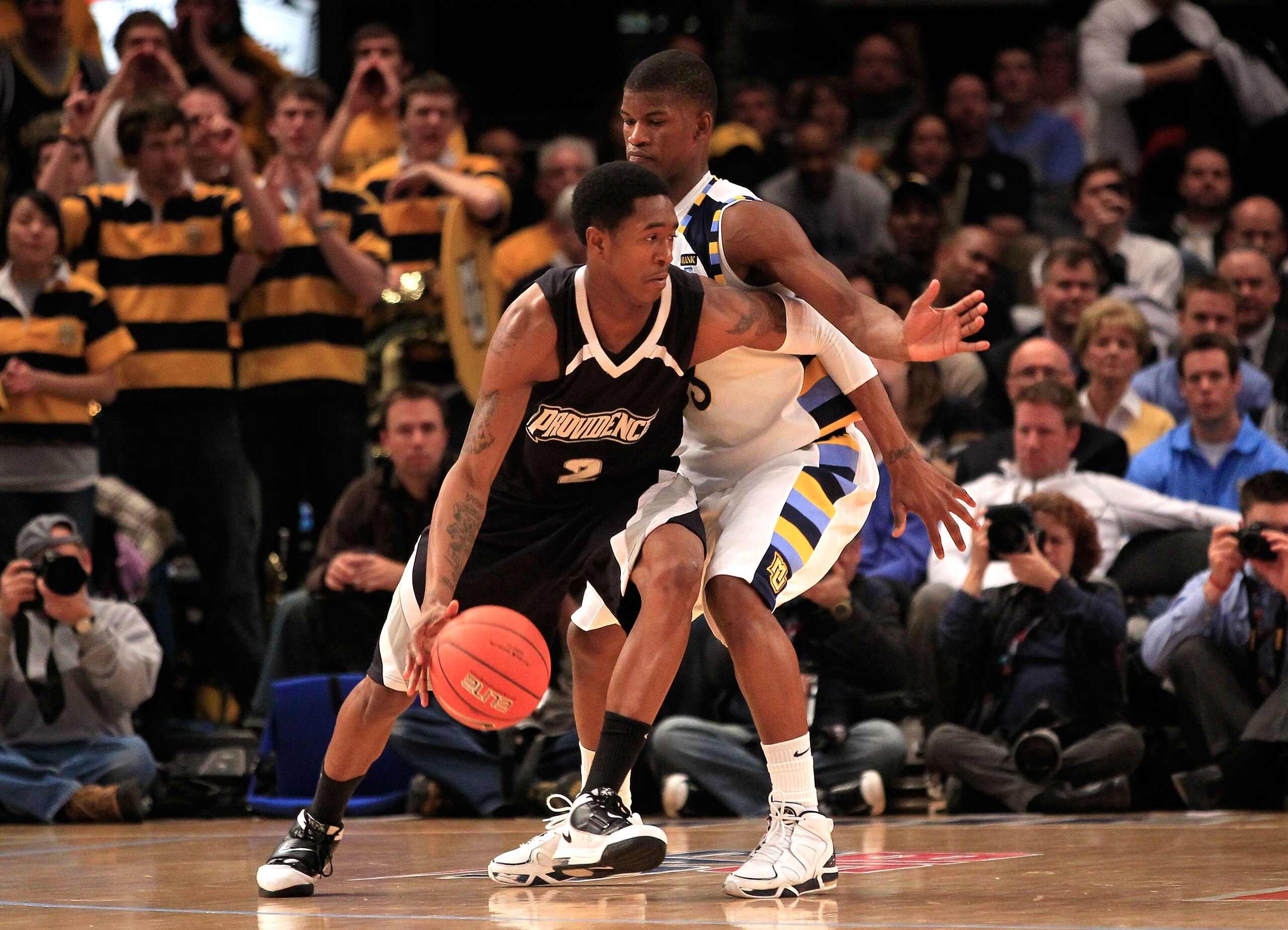 NEW YORK, NY - MARCH 08: Marshon Brooks #2 of the Providence Friars dribbles the ball against Jimmy Butler #33 of the Marquette Golden Eagles during the first round of the 2011 Big East Men's Basketball Tournament presented by American Eagle Outfitters at NEW YORK, NY - MARCH 08: Marshon Brooks #2 of the Providence Friars dribbles the ball against Jimmy Butler #33 of the Marquette Golden Eagles during the first round of the 2011 Big East Men's Basketball Tournament presented by American Eagle Outfitters at