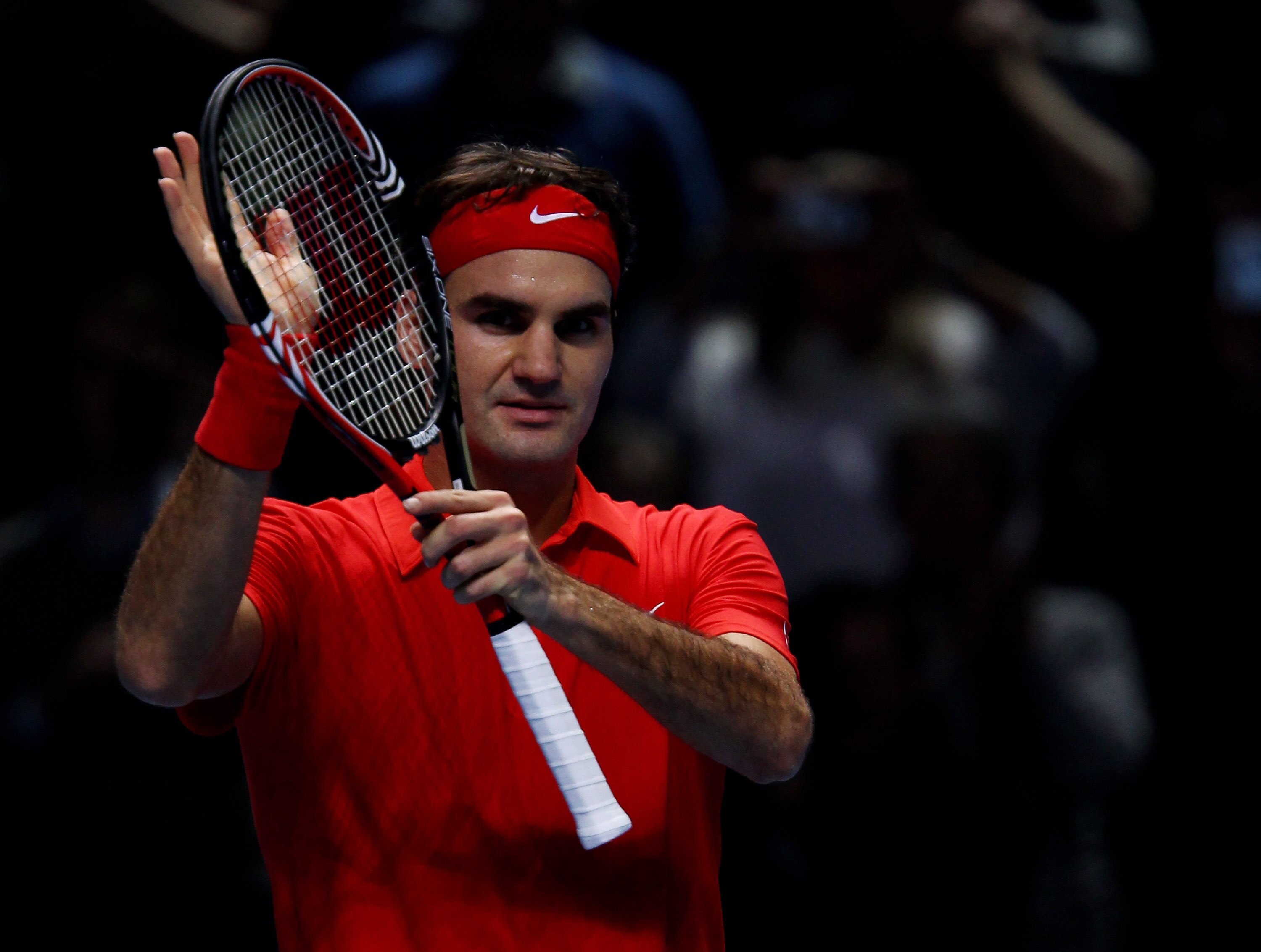LONDON, ENGLAND - NOVEMBER 21:  Roger Federer of Switzerland celebrates after winning his men's singles first round match against David Ferrer of Spain during the Barclays ATP World Tour Finals at O2 Arena on November 21, 2010 in London, England.  (Photo