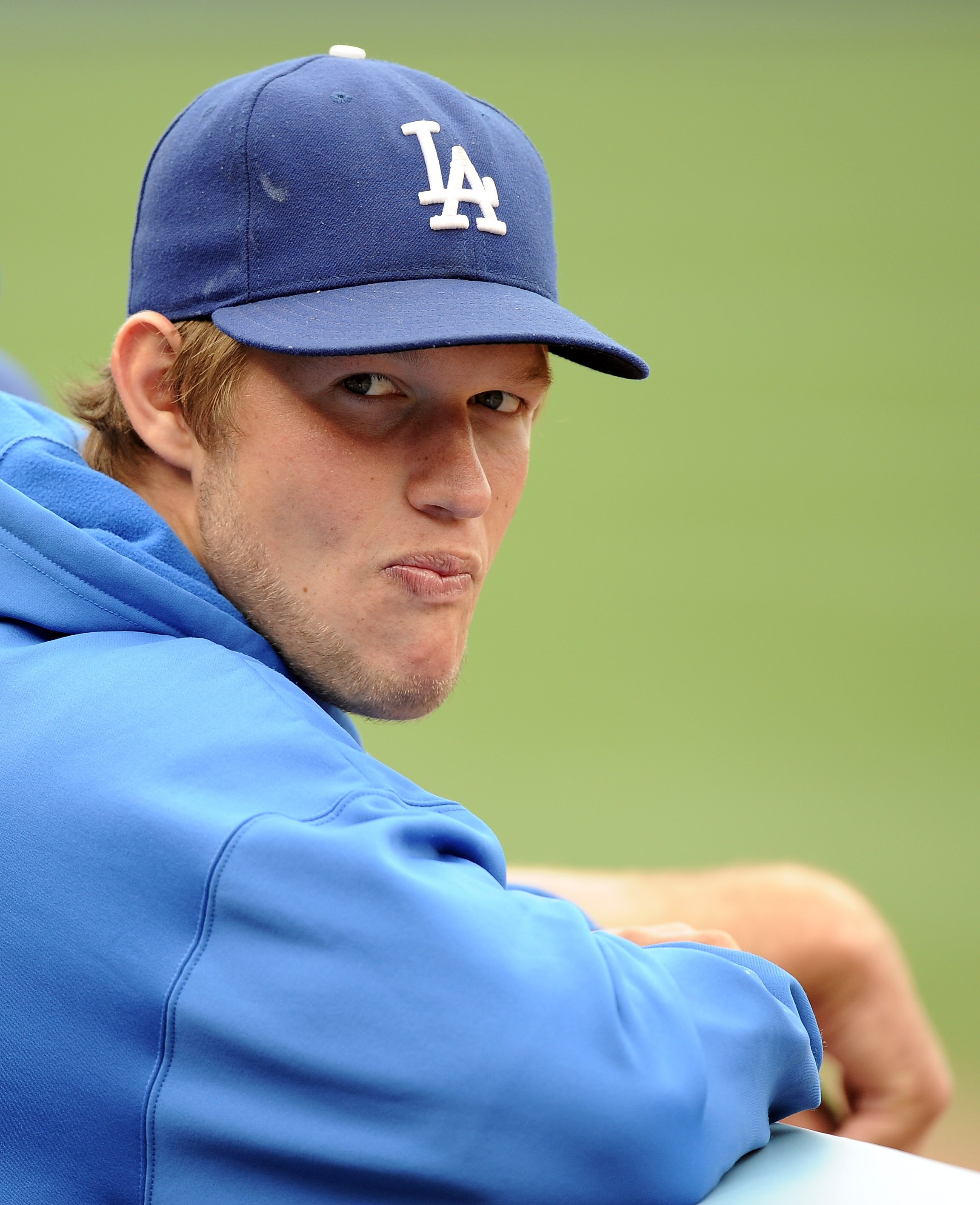 LOS ANGELES, CA - MAY 14:  Clayton Kershaw #22 of the Los Angeles Dodgers watches play from the dugout against the Arizona Diamondbacks at Dodger Stadium on May 14, 2011 in Los Angeles, California.  (Photo by Harry How/Getty Images)
