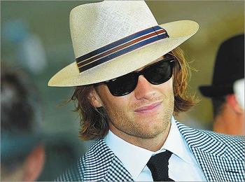 Tom Brady showed up to the 2011 Kentucky Derby in this 1920's, or 1930's, whatever, It's old school. Note the hat, classic.