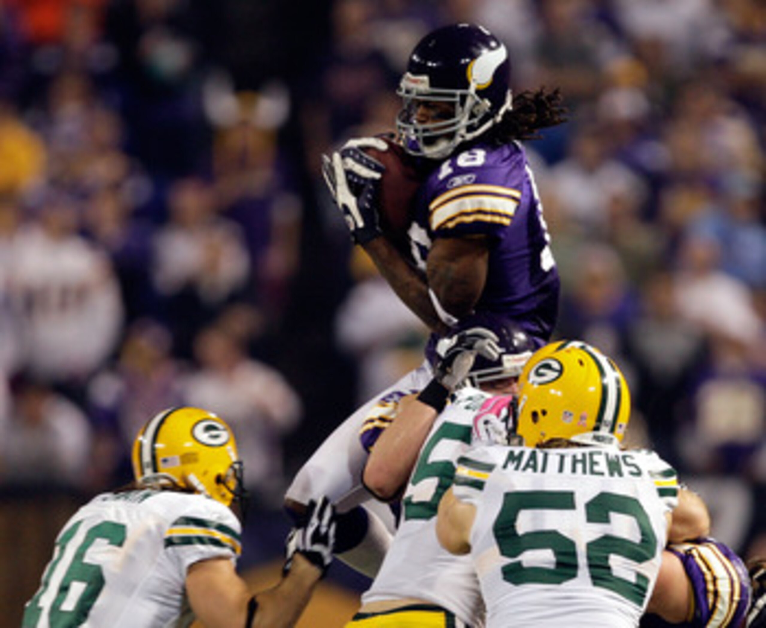 MINNEAPOLIS - OCTOBER 05: Receiver Sidney Rice #18 of the Minnesota Vikings fields an on-side kick during the Monday Night Football game against the Green Bay Packers on October 5, 2009 at Hubert H. Humphrey Metrodome in Minneapolis, Minnesota. (Photo b MINNEAPOLIS - OCTOBER 05: Receiver Sidney Rice #18 of the Minnesota Vikings fields an on-side kick during the Monday Night Football game against the Green Bay Packers on October 5, 2009 at Hubert H. Humphrey Metrodome in Minneapolis, Minnesota. (Photo b