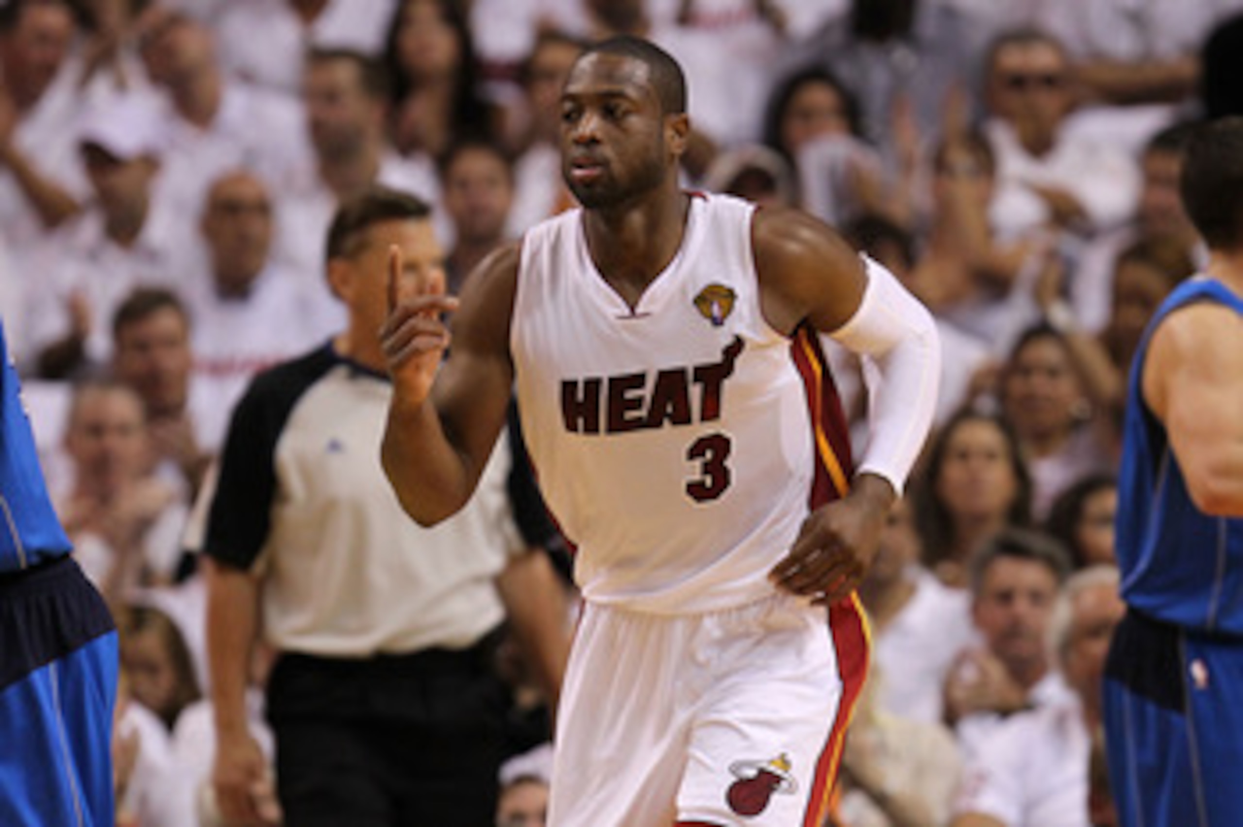 MIAMI, FL - MAY 31: Dwyane Wade #3 of the Miami Heat reacts against the Dallas Mavericks in Game One of the 2011 NBA Finals at American Airlines Arena on May 31, 2011 in Miami, Florida. NOTE TO USER: User expressly acknowledges and agrees that, by downloa