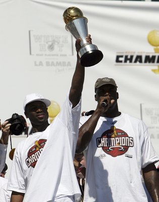 MIAMI - JUNE 23: Shaquille O'Neal #32 (R) and Dwyane Wade #3 of the Miami Heat celebrates during the victory parade and celebration at American Airlines Arena on June 23, 2006 in Miami, Florida. NOTE TO USER: User expressly acknowledges and agrees that, MIAMI - JUNE 23: Shaquille O'Neal #32 (R) and Dwyane Wade #3 of the Miami Heat celebrates during the victory parade and celebration at American Airlines Arena on June 23, 2006 in Miami, Florida. NOTE TO USER: User expressly acknowledges and agrees that,