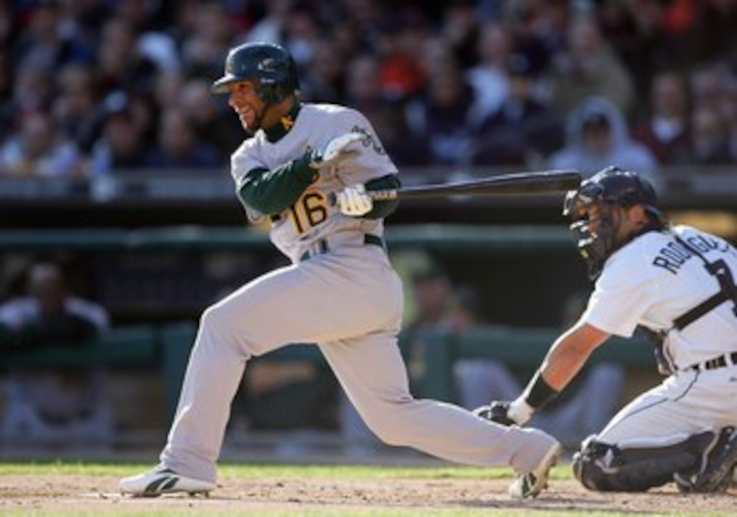 DETROIT - OCTOBER 14: Jay Payton #16 of the Oakland Athletics swings at the pitch against the Detroit Tigers to make it 3-0 in the fourth inning of Game Four of the American League Championship Series on October 14, 2006 at Comerica Park in Detroit, Michi