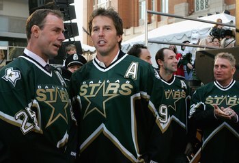 DALLAS - JANUARY 22:   Mike Modano #9 and Joe Nieuwendyk #25 of the 1999 Dallas Stars Stanley Cup team look on during the 1999 Dallas Stars Stanley Cup Reunion at the American Airlines Center on January 22, 2007 in Dallas, Texas.  (Photo by Bruce Bennett/
