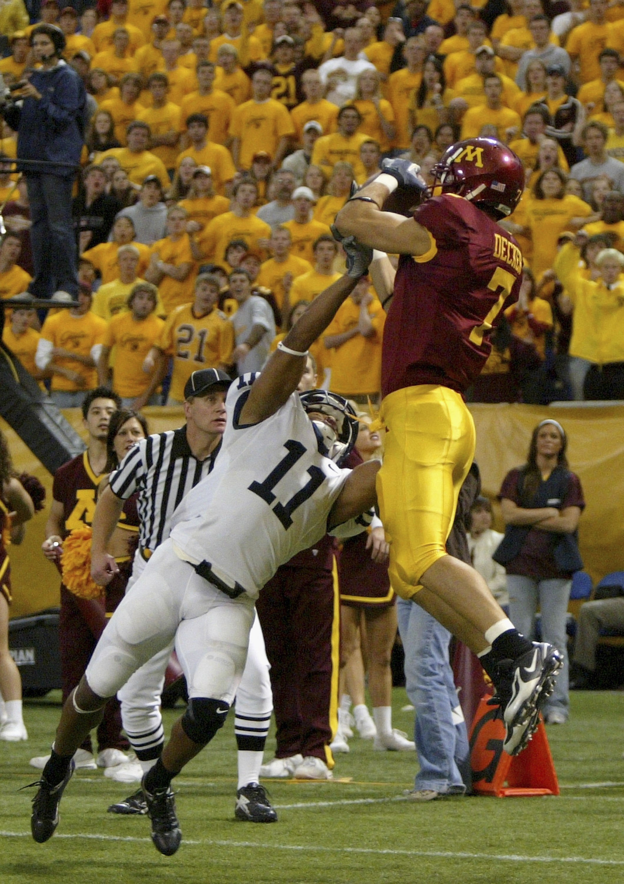 MINNEAPOLIS, MN - OCTOBER 07:  Eric Decker #7 of the Minnesota Golden Gophers scores the go ahead  touchdown in overtime on a reception over Tony Davis #11 of the Penn State Nittany Lions as Penn State defeated Minnesota 28-27 in overtime on October 7, 20