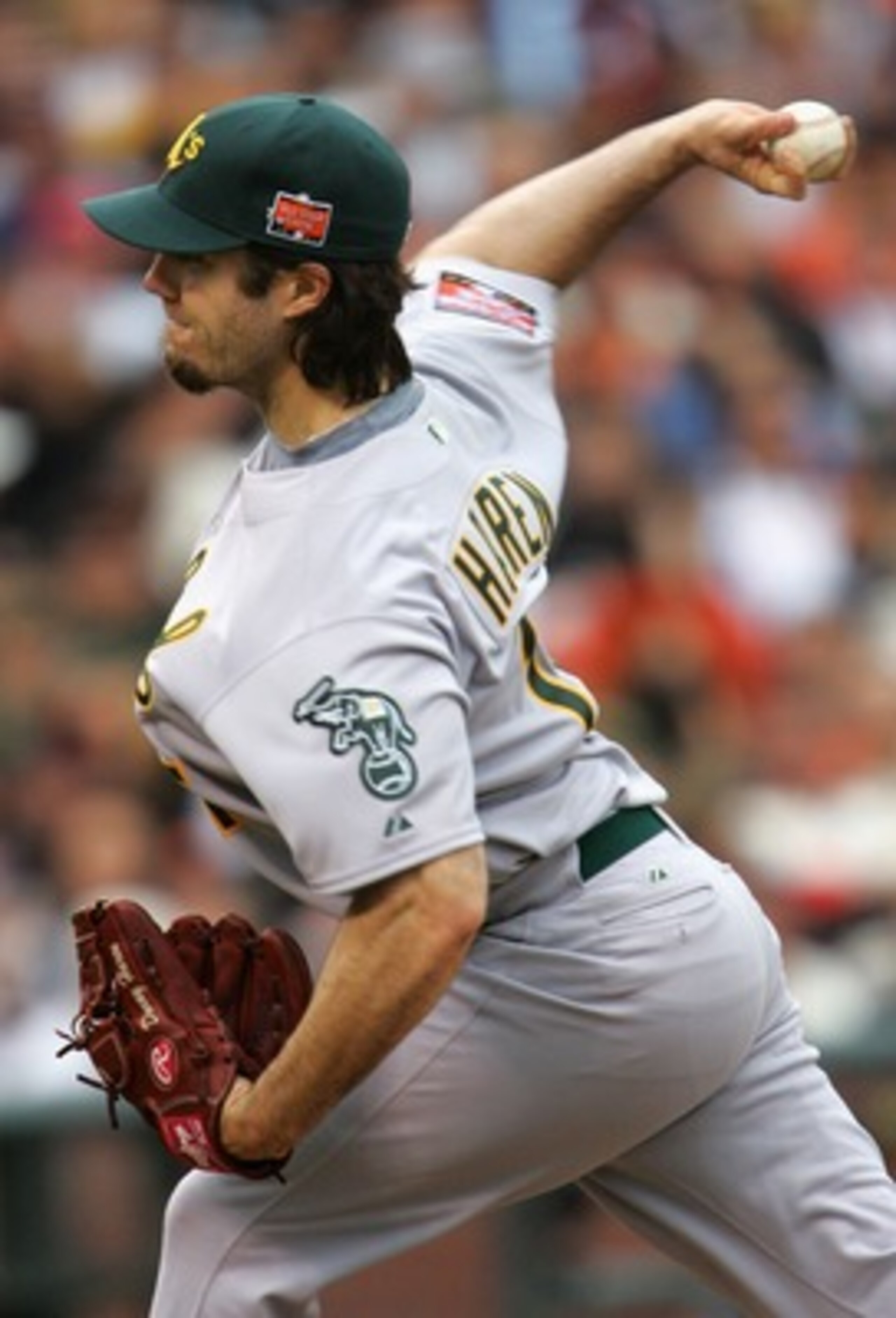 SAN FRANCISCO - JULY 10:  American League All-Star starting pitcher Dan Haren #15 of the Oakland A's pitches during the first inning of the 78th Major League Baseball All-Star Game at AT&T Park on July 10, 2007 in San Francisco, California.  (Photo by Jef