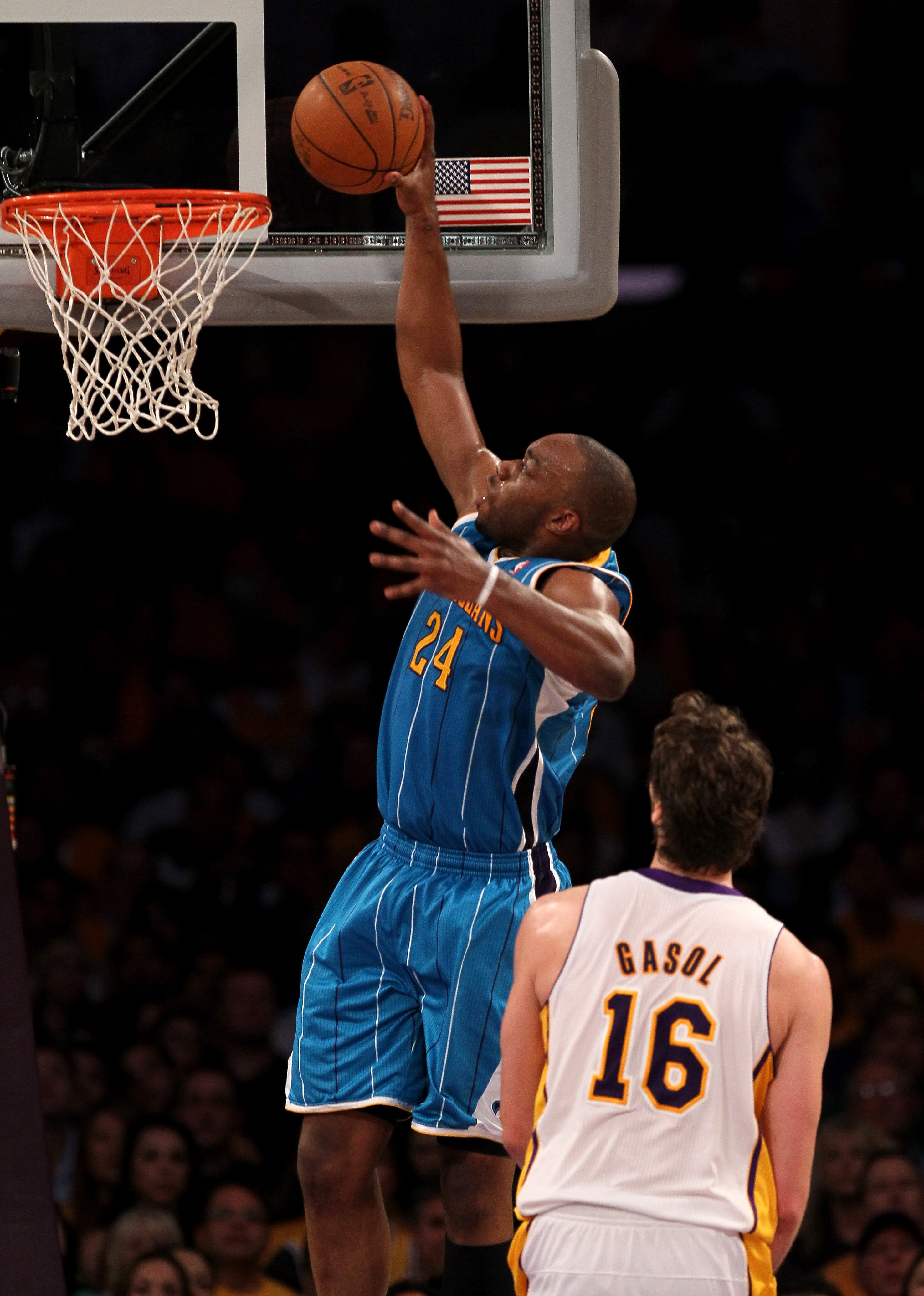 LOS ANGELES, CA - APRIL 17:  Carl Landry #24 of  the New Orleans Hornets dunks over Pau Gasol #16 of the Los Angeles Lakers in Game One of the Western Conference Quarterfinals in the 2011 NBA Playoffs on April 17, 2011 at Staples Center in Los Angeles, Ca