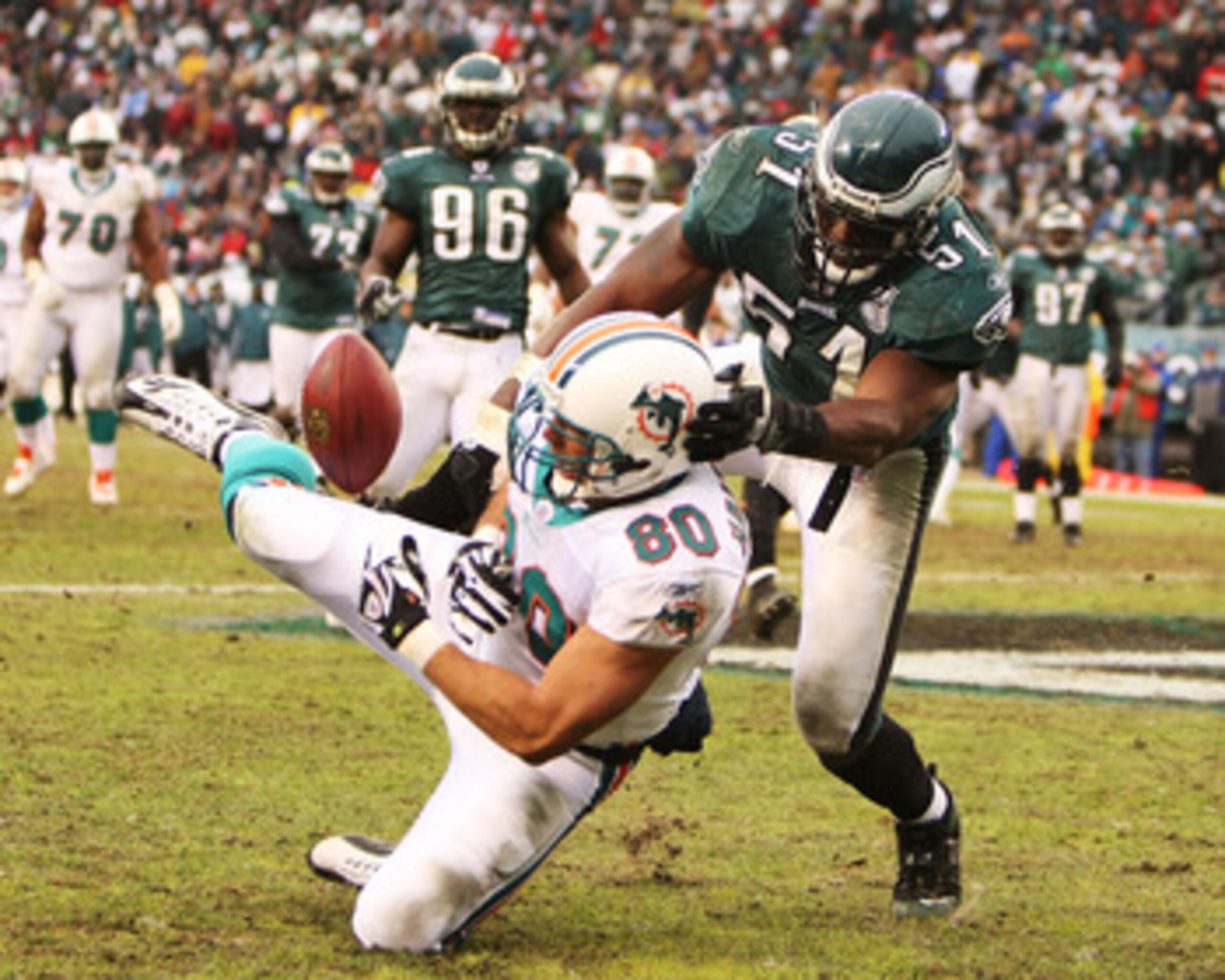 PHILADELPHIA - NOVEMBER 18:  Takeo Spikes #51 of the Philadelphia Eagles breaks up a touchdown pass to Derek Halterman #80 of the Miami Dolphins on third and goal in the fourth quarter on November 18, 2007 at Lincoln Financial Field in Philadelphia, Penns
