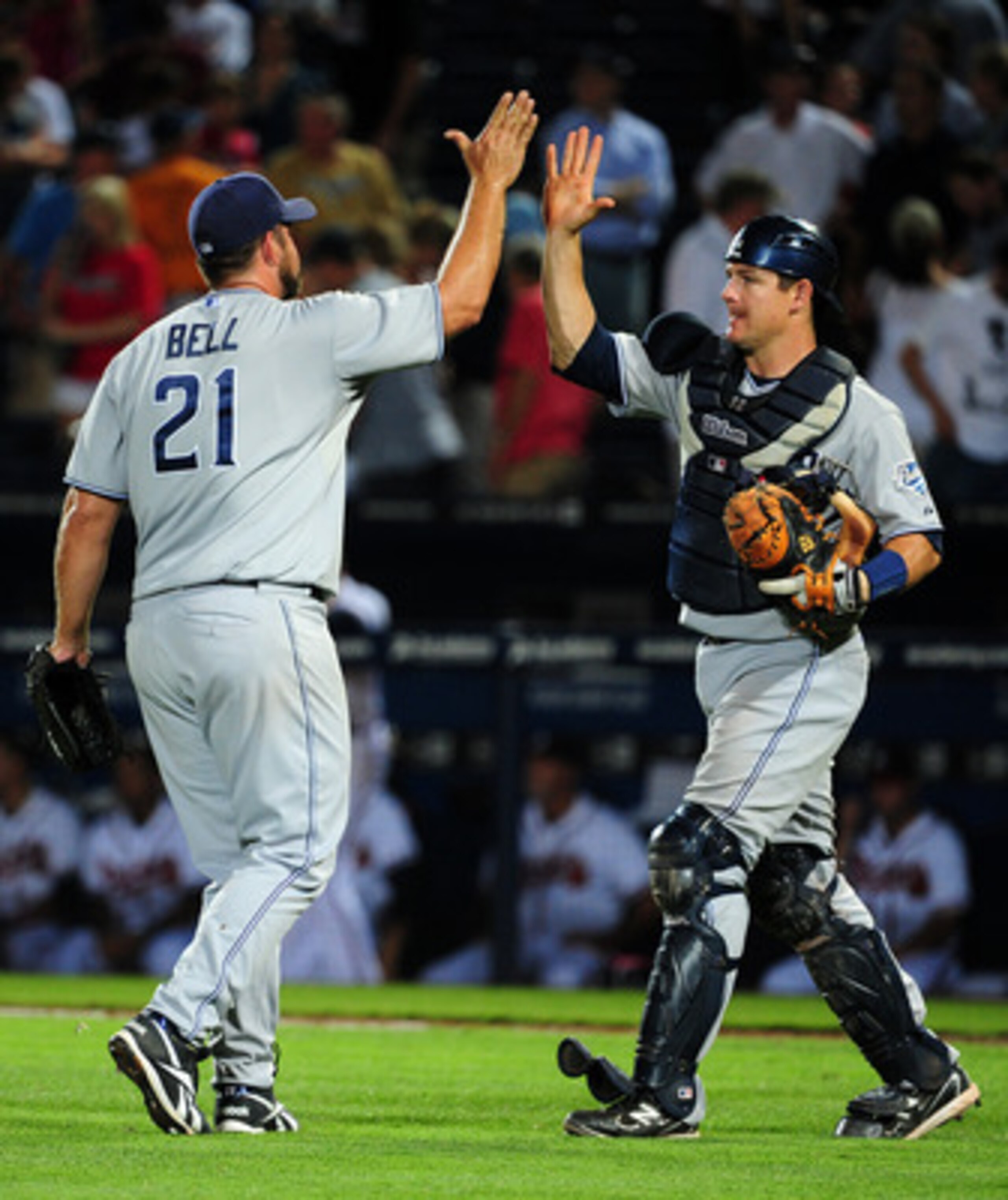 ATLANTA - MAY 31: Heath Bell #21 and Rob Johnson #32 of the San Diego Padres celebrate after the game against the Atlanta Braves at Turner Field on May 31, 2011 in Atlanta, Georgia. (Photo by Scott Cunningham/Getty Images)