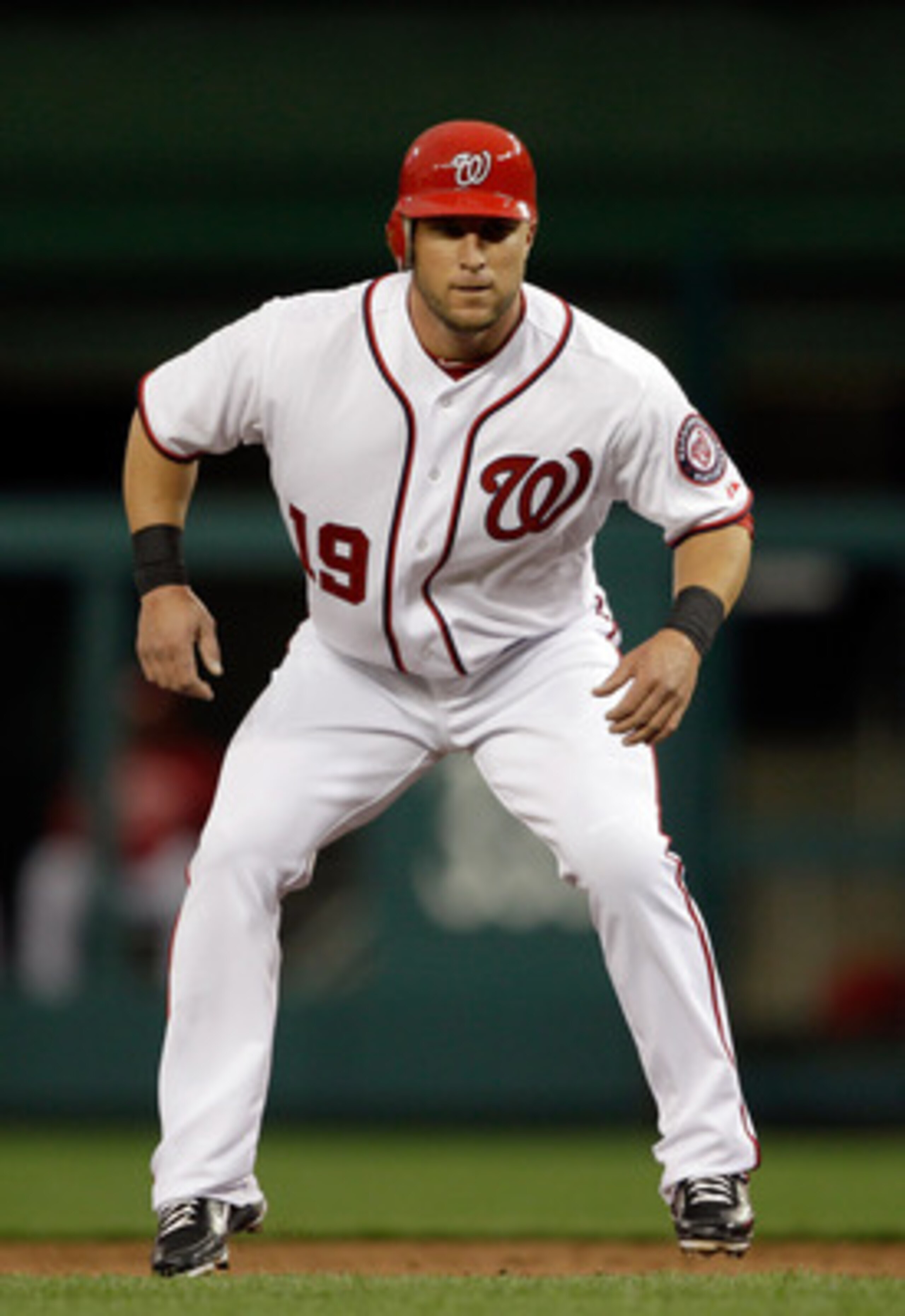 WASHINGTON, DC - APRIL 12: Laynce Nix #19 of the Washington Nationals leads off against the Philadelphia Phillies at Nationals Park on April 12, 2011 in Washington, DC. (Photo by Rob Carr/Getty Images)
