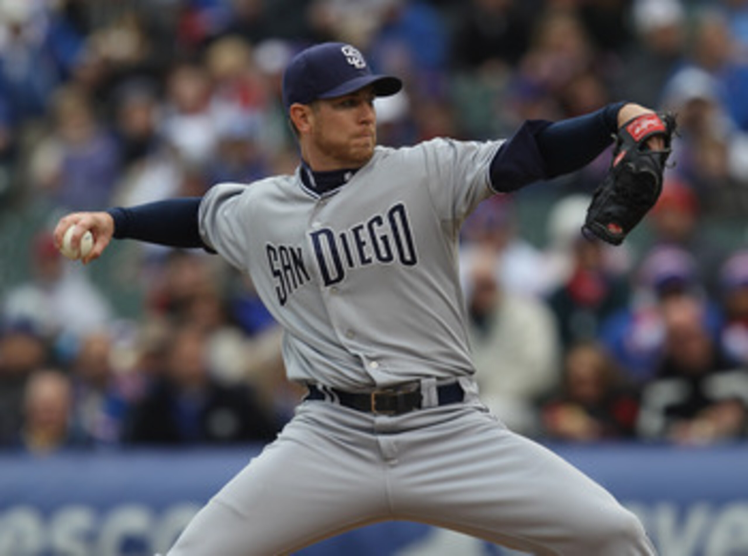 CHICAGO, IL - APRIL 20: Starting pitcher Dustin Moseley #26 of the San Diego Padres delivers the ball against the Chicago Cubs at Wrigley Field on April 20, 2011 in Chicago, Illinois. (Photo by Jonathan Daniel/Getty Images)