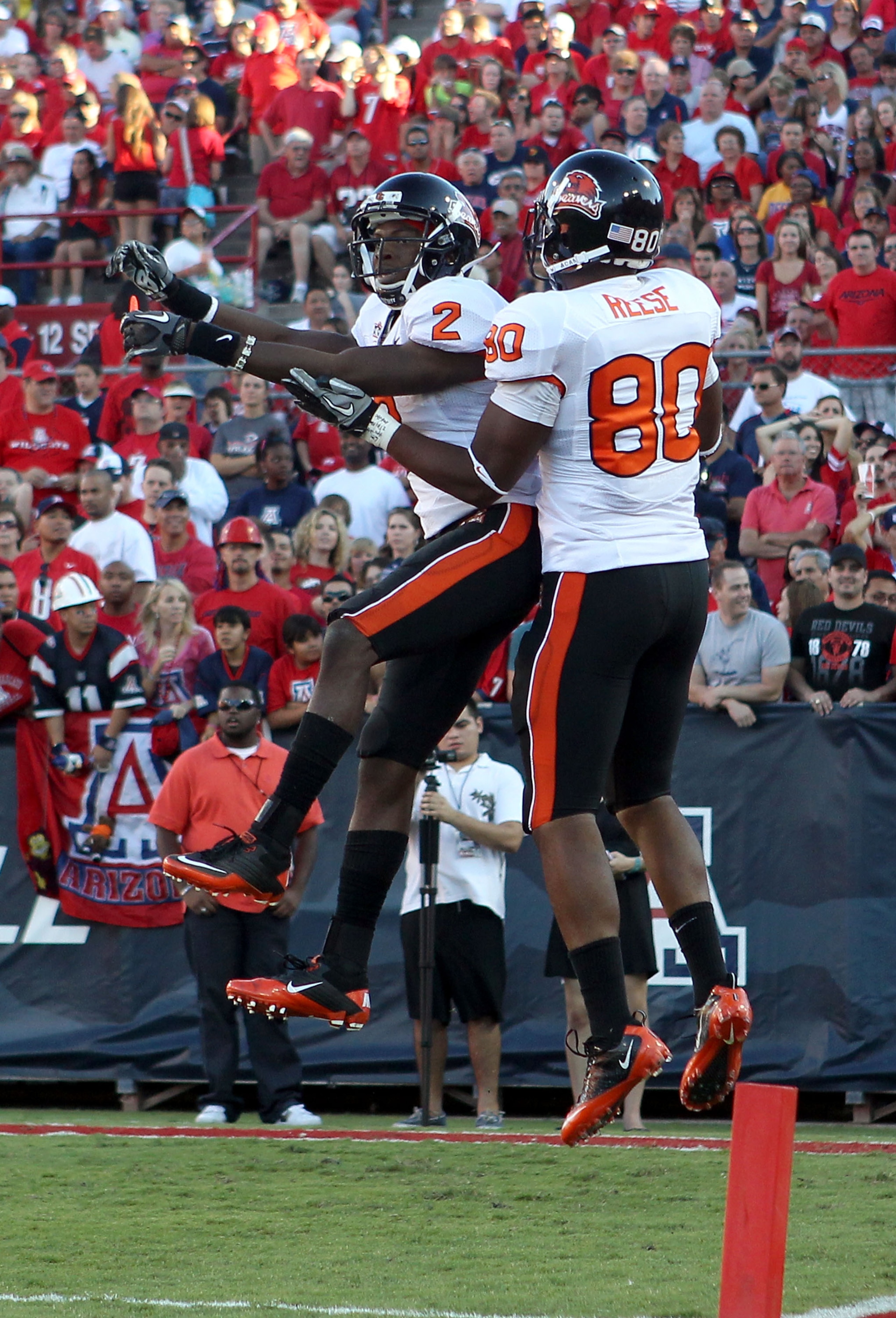 TUCSON, AZ - OCTOBER 09:  Wide receiver Markus Wheaton #2 of the Oregon State Beavers celebrates with teammate John Reese #80 after a 48 yard touchdown reception against the Arizona Wildcats during the second quarter of the college football game at Arizon