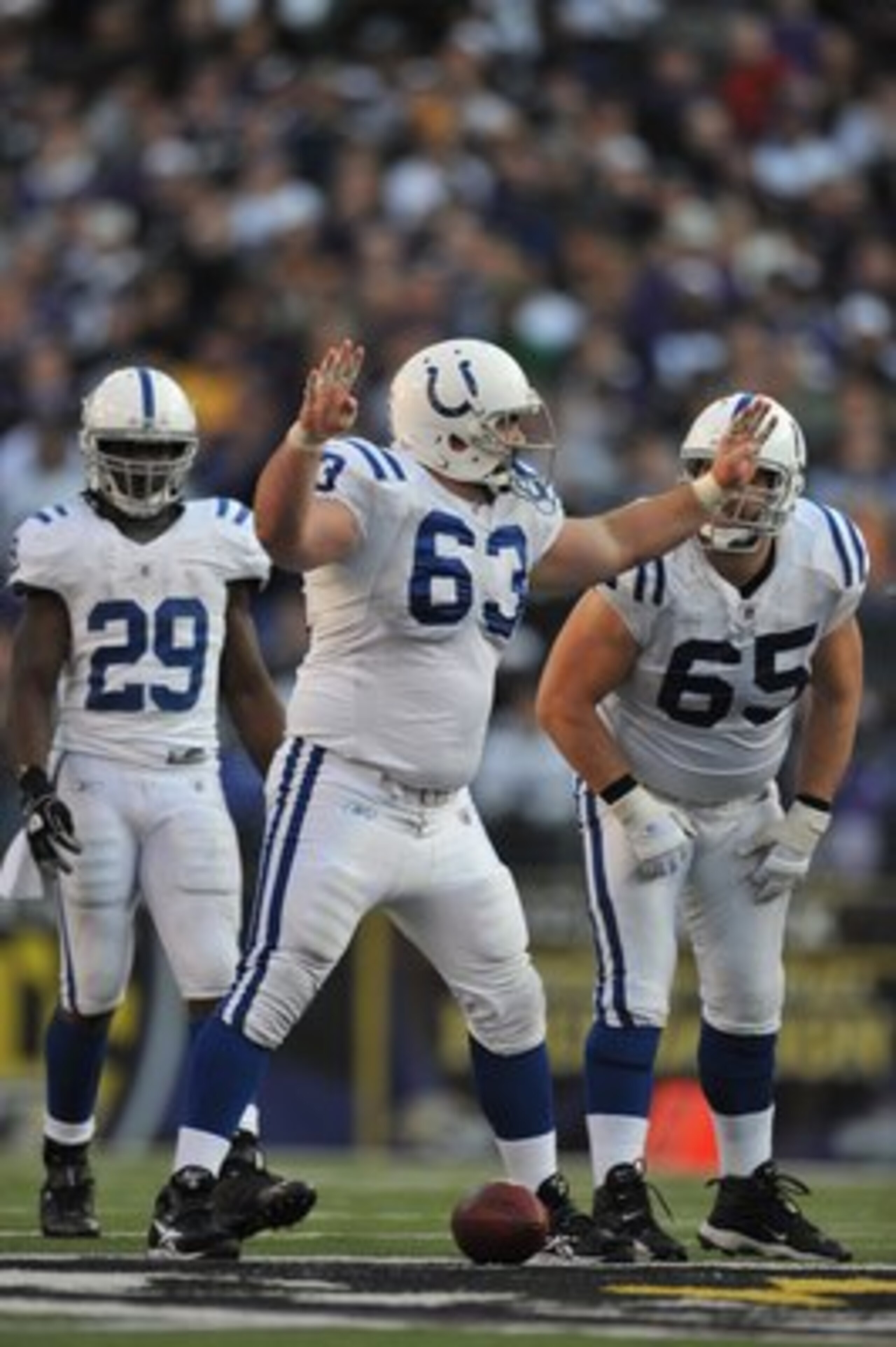 BALTIMORE - NOVEMBER 22:  Jeff Saturday #63 of the Indianapolis Colts signals to the offensive line during the game against the Baltimore Ravens at M&T Bank Stadium on November 22, 2009 in Baltimore, Maryland. The Colts defeated the Ravens 17-15. (Photo b