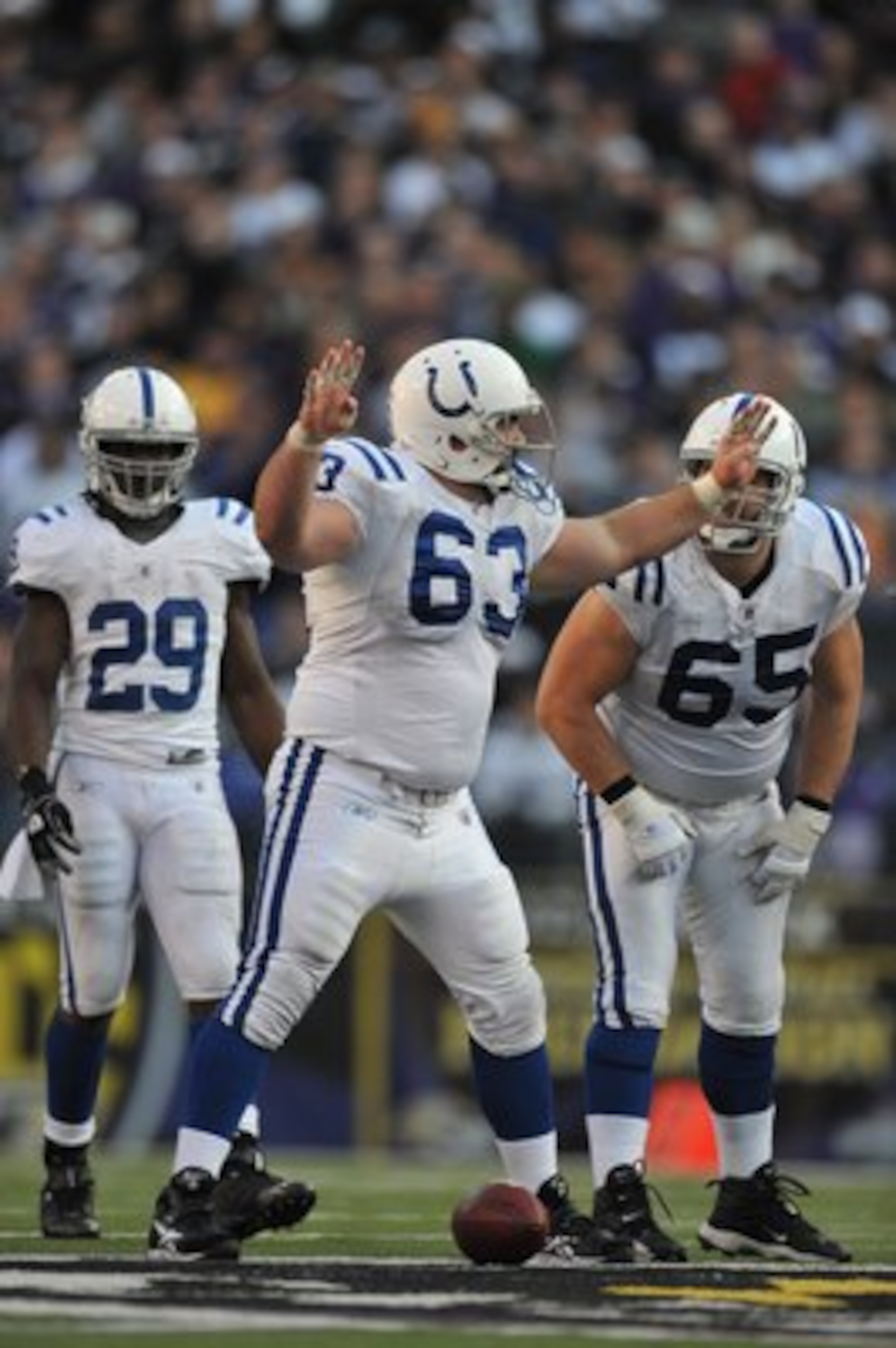BALTIMORE - NOVEMBER 22:  Jeff Saturday #63 of the Indianapolis Colts signals to the offensive line during the game against the Baltimore Ravens at M&T Bank Stadium on November 22, 2009 in Baltimore, Maryland. The Colts defeated the Ravens 17-15. (Photo b