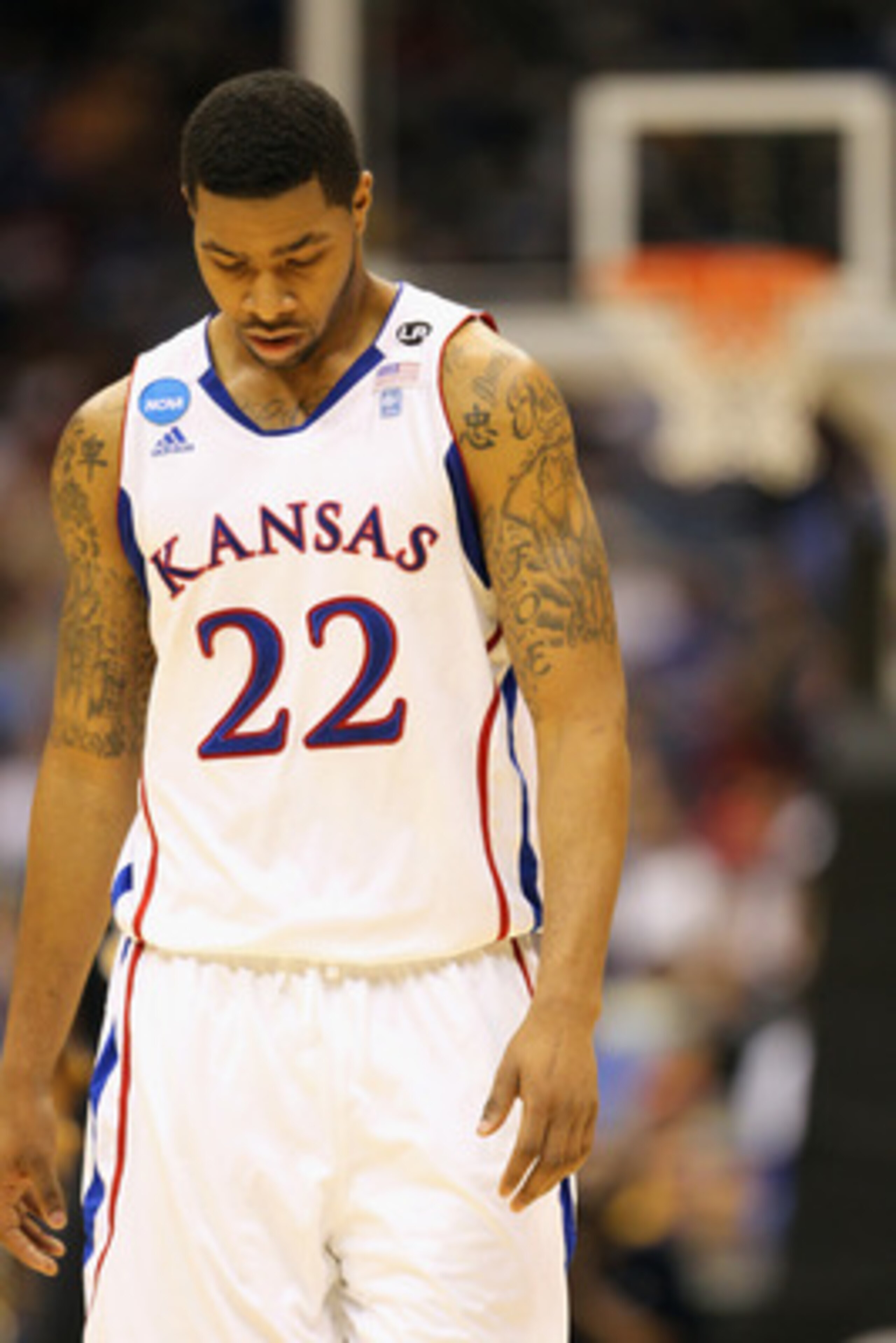 SAN ANTONIO, TX - MARCH 27:  Marcus Morris #22 of the Kansas Jayhawks reacts during the southwest regional final of the 2011 NCAA men's basketball tournament against the Virginia Commonwealth Rams at the Alamodome on March 27, 2011 in San Antonio, Texas.