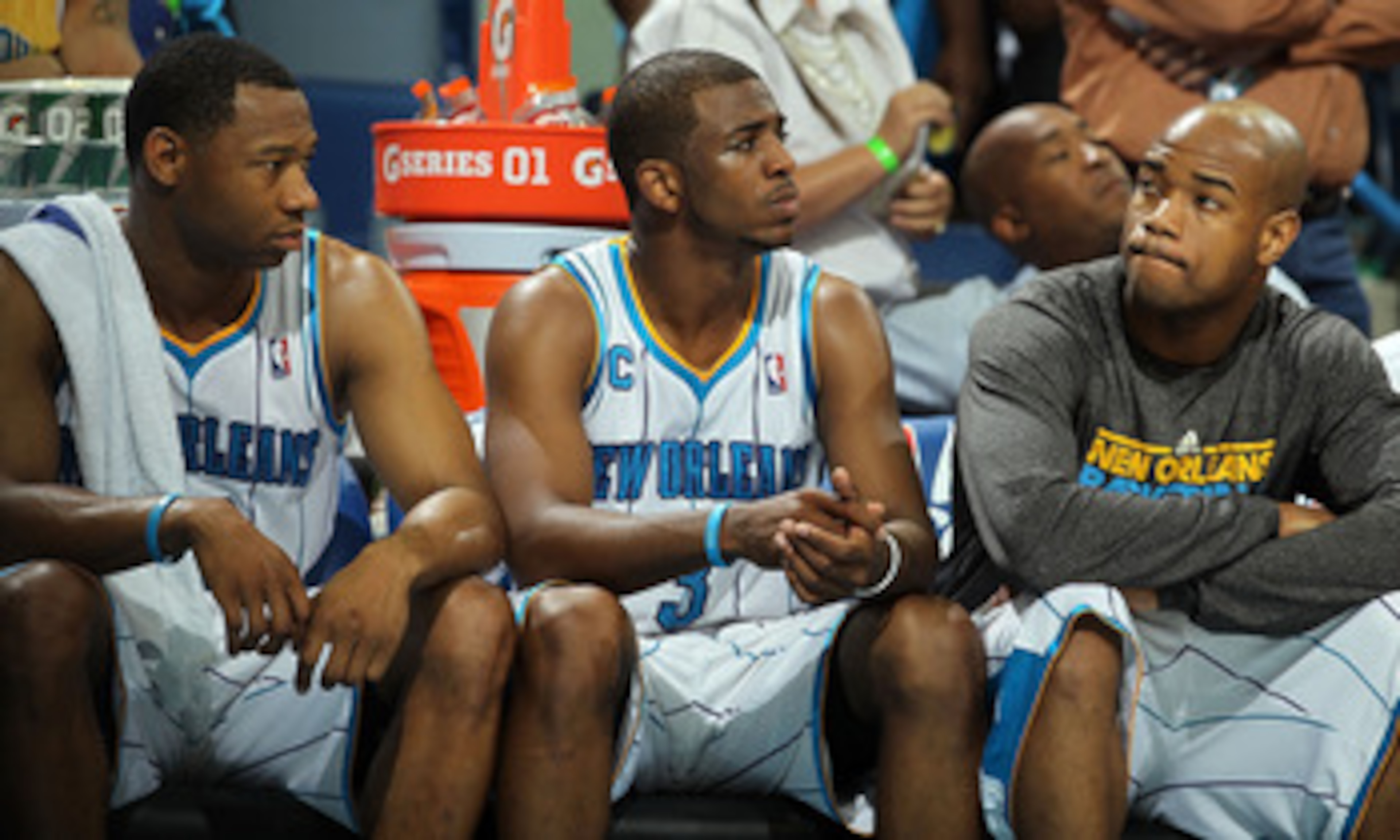 NEW ORLEANS, LA - APRIL 28:  (L-R) Willie Green #33, Chris Paul #3 and Jarrett Jack #2 of the New Orleans Hornets react on the bench during a 98-80 loss against the Los Angeles Lakers in Game Six of the Western Conference Quarterfinals in the 2011 NBA Pla