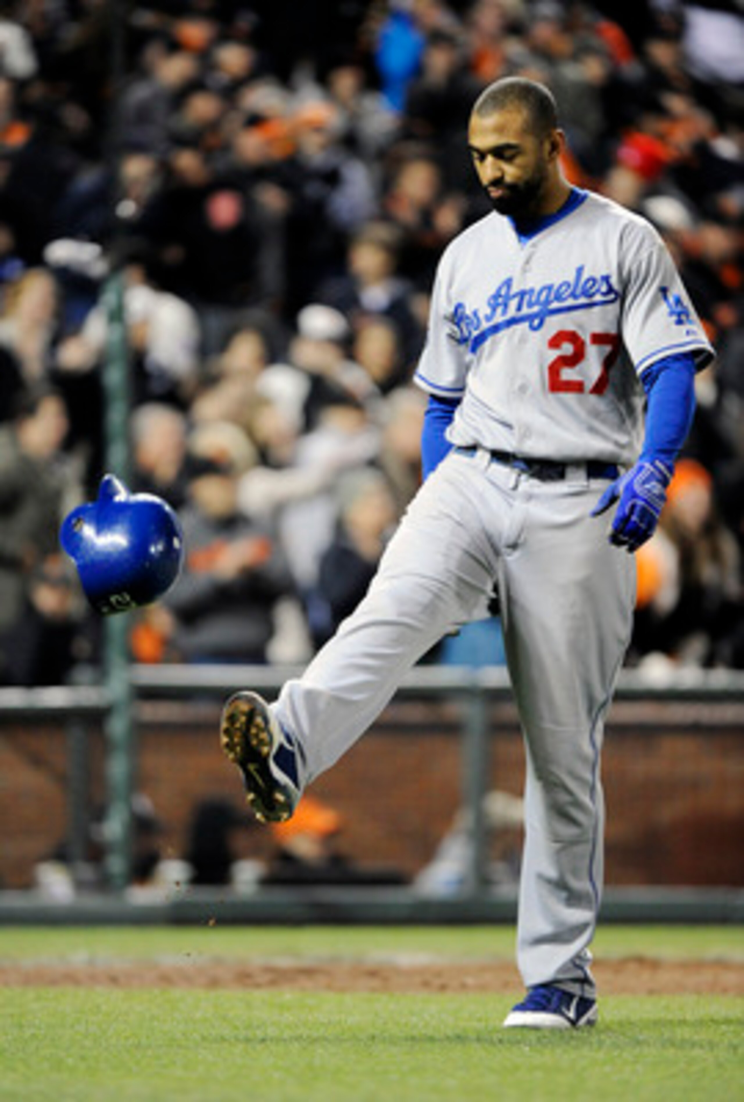SAN FRANCISCO, CA - APRIL 13:  Matt Kemp #27 of the Los Angeles Dodgers kicks his helmet after striking out for the third out in the top of the 7th inning against the San Francisco Giants during a MLB baseball game at AT&T Park April 13, 2011 in San Franc