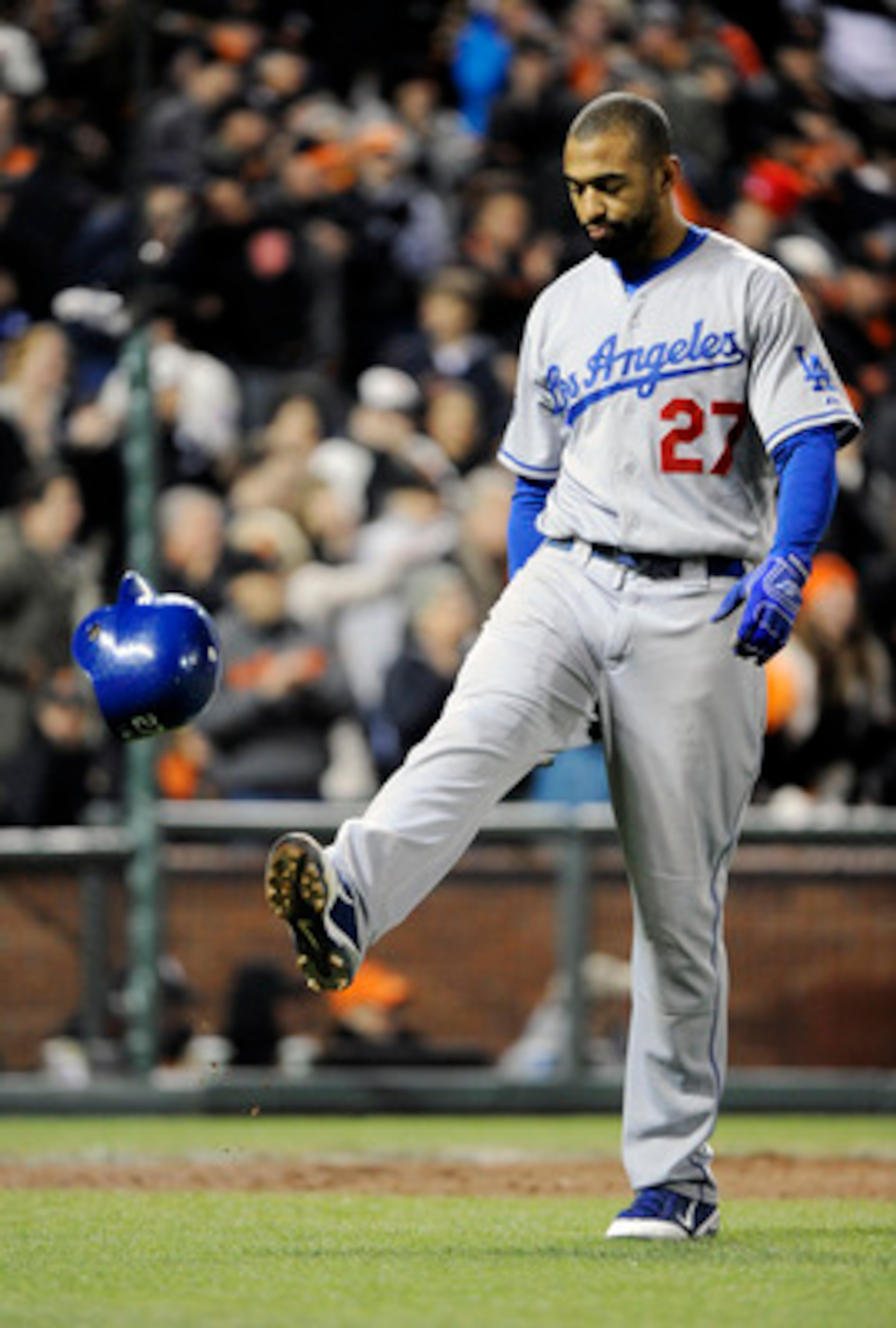 SAN FRANCISCO, CA - APRIL 13:  Matt Kemp #27 of the Los Angeles Dodgers kicks his helmet after striking out for the third out in the top of the 7th inning against the San Francisco Giants during a MLB baseball game at AT&T Park April 13, 2011 in San Franc