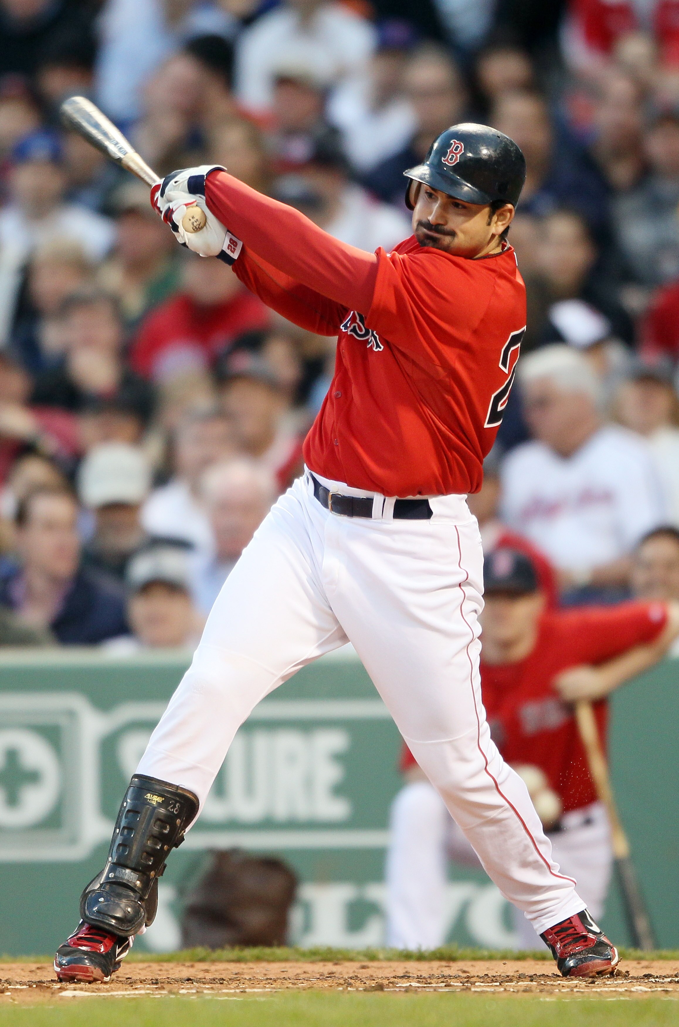 BOSTON, MA - MAY 20:  Adrian Gonzalez #28 of the Boston Red Sox gets a hits a in the first inning against the Chicago Cubs on May 20, 2011 at Fenway Park in Boston, Massachusetts.on May 20, 2011 at Fenway Park in Boston, Massachusetts. The Chicago Cubs an