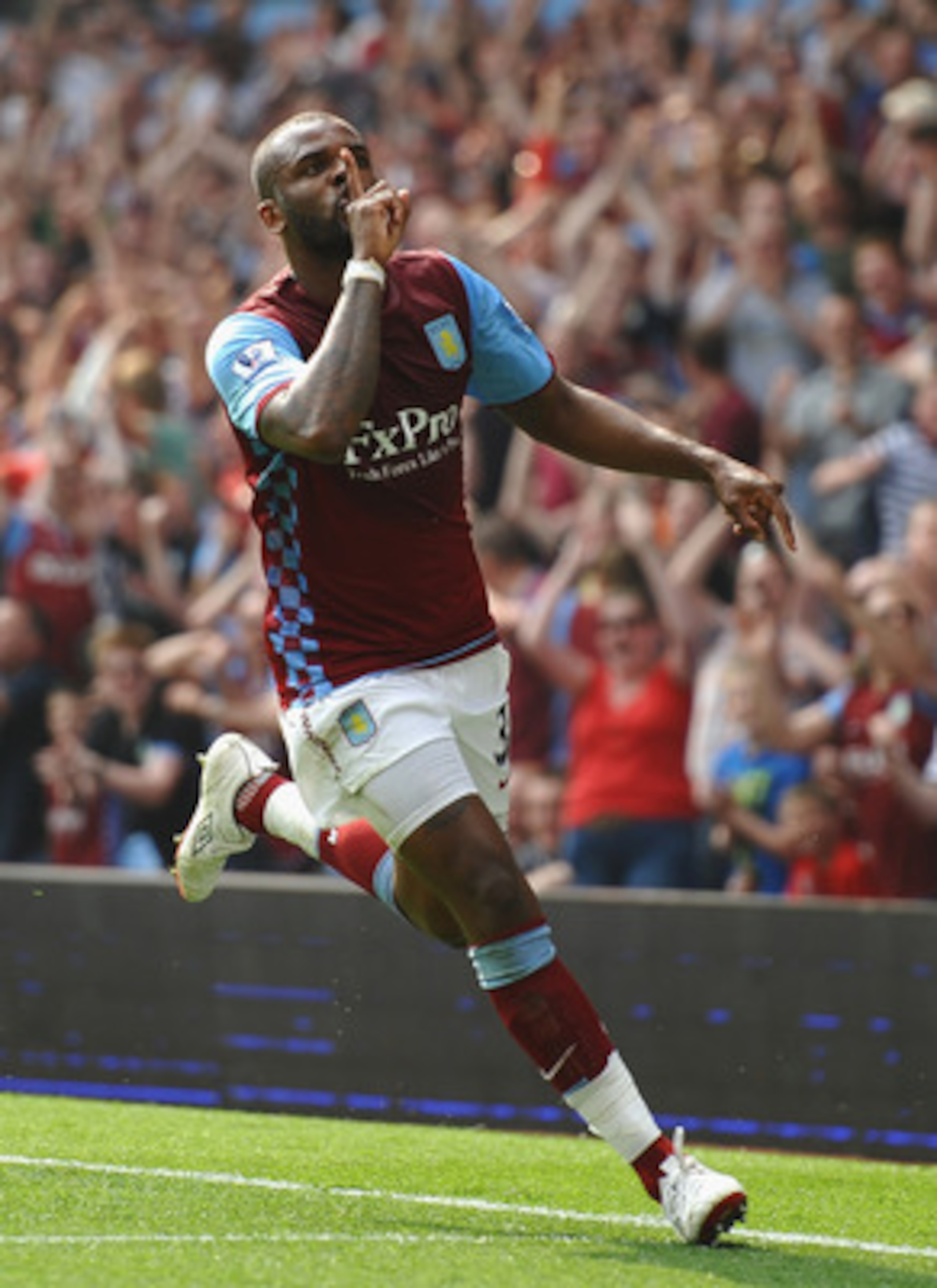 BIRMINGHAM, ENGLAND - APRIL 23:  Darren Bent of Aston Villa celebrates scoring the equaliser during the Barclays Premier League match between Aston Villa and Stoke City at Villa Park on April 23, 2011 in Birmingham, England.  (Photo by Laurence Griffiths/