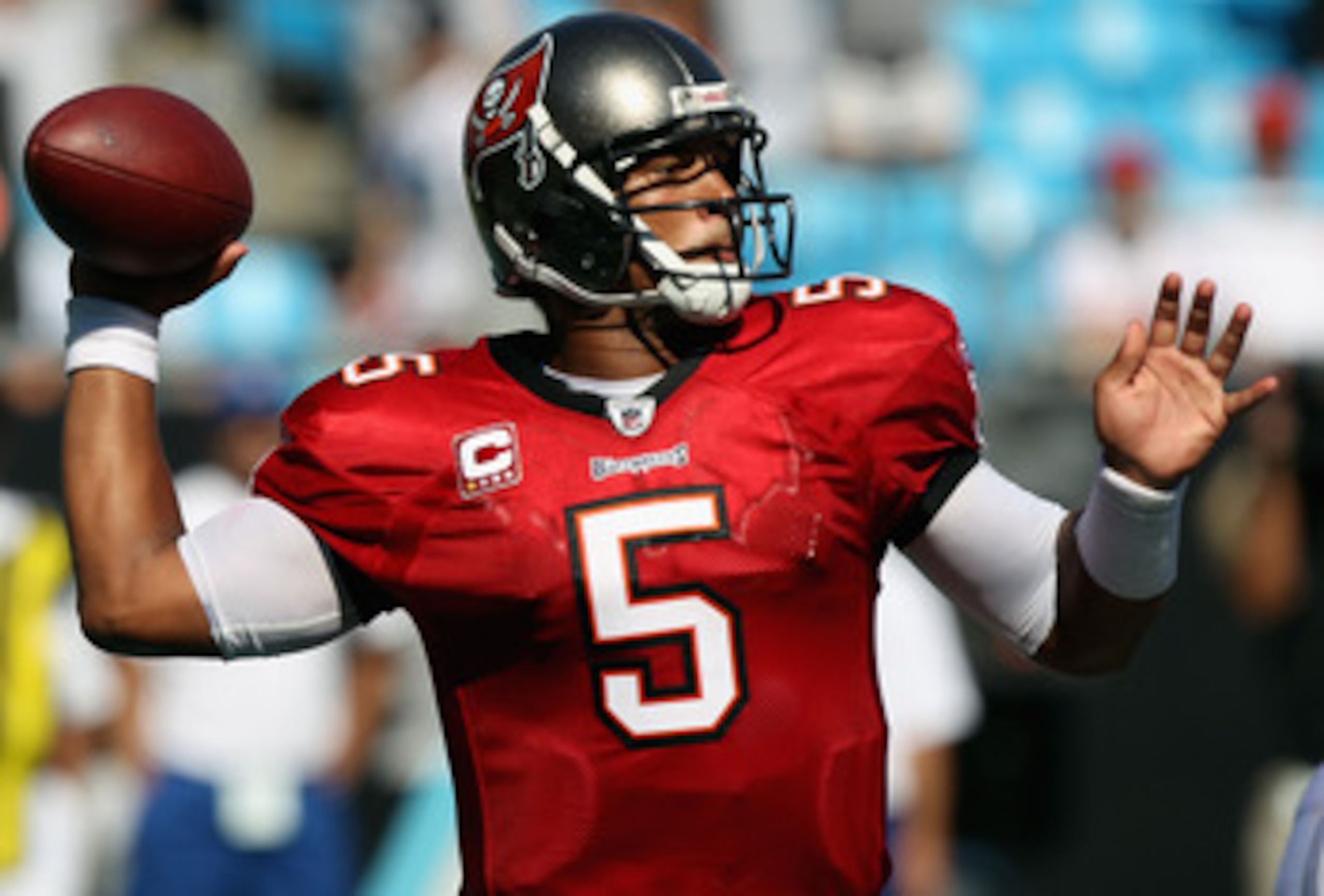 CHARLOTTE, NC - SEPTEMBER 19:  Josh Freeman #5 of the Tampa Bay Buccaneers throws a pass against the Carolina Panthers during their game at Bank of America Stadium on September 19, 2010 in Charlotte, North Carolina.  (Photo by Streeter Lecka/Getty Images)