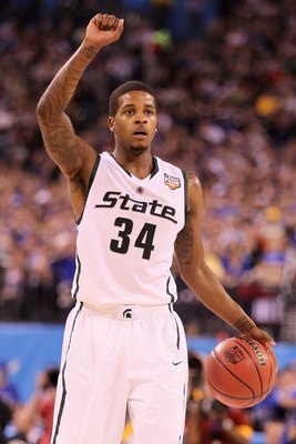 INDIANAPOLIS - APRIL 03:  Korie Lucious #34 of the Michigan State Spartans with the ball against the Butler Bulldogs during the National Semifinal game of the 2010 NCAA Division I Men's Basketball Championship on April 3, 2010 in Indianapolis, Indiana.  (