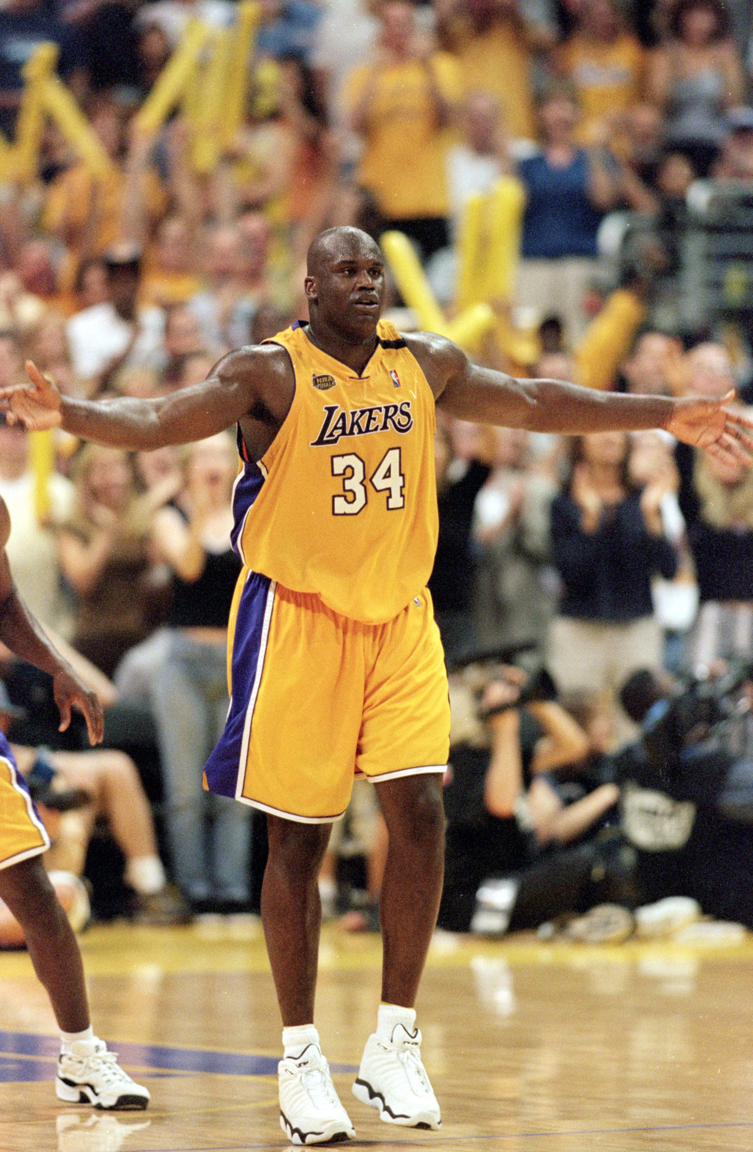 19 Jun 2000:  Shaquille O''Neal #34 of the Los Angeles Lakers celebrates on the court during the NBA Finals Game 6 against the Indiana Pacers at the Staples Center in Los Angeles, California.  The Lakers defeated the Pacers in 116-111.    NOTE TO USER: It