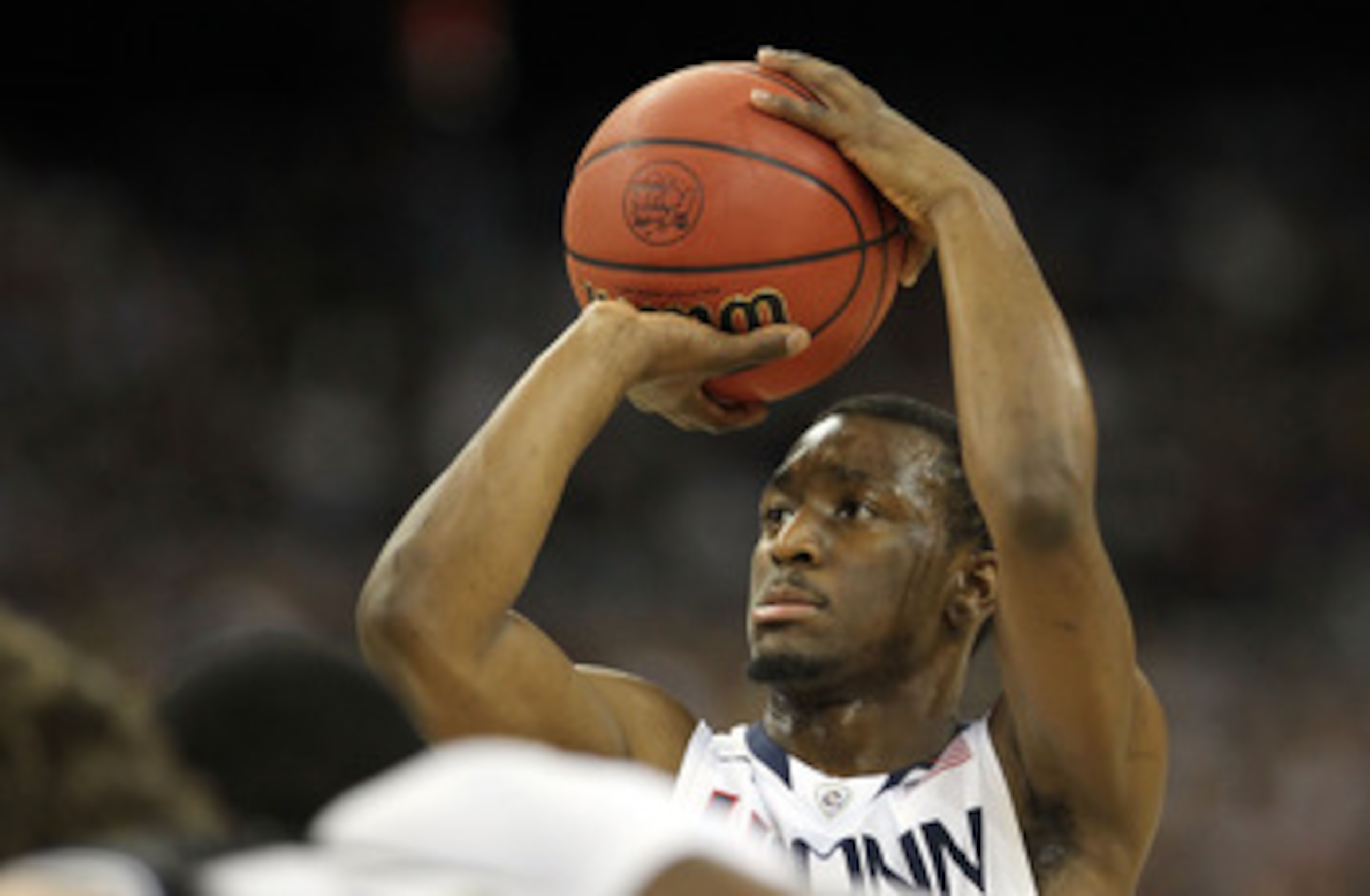 HOUSTON, TX - APRIL 04:  Kemba Walker #15 of the Connecticut Huskies at the free throw line against the Butler Bulldogs during the National Championship Game of the 2011 NCAA Division I Men's Basketball Tournament at Reliant Stadium on April 4, 2011 in Ho