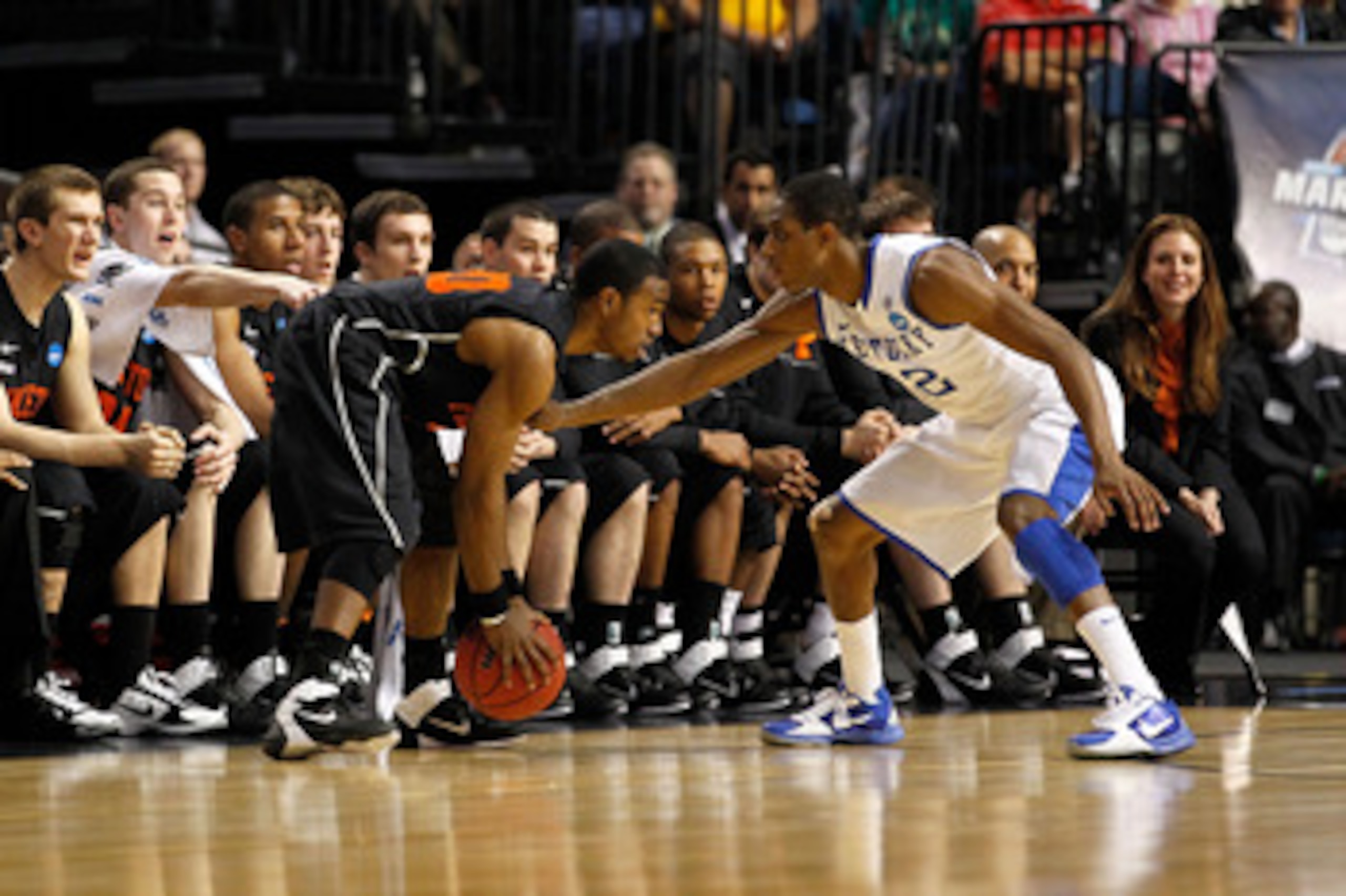 TAMPA, FL - MARCH 17:  Douglas Davis #20 of the Princeton Tigers looks to drive against Brandon Knight #12 of the Kentucky Wildcats during the second round of the 2011 NCAA men's basketball tournament at St. Pete Times Forum on March 17, 2011 in Tampa, Fl