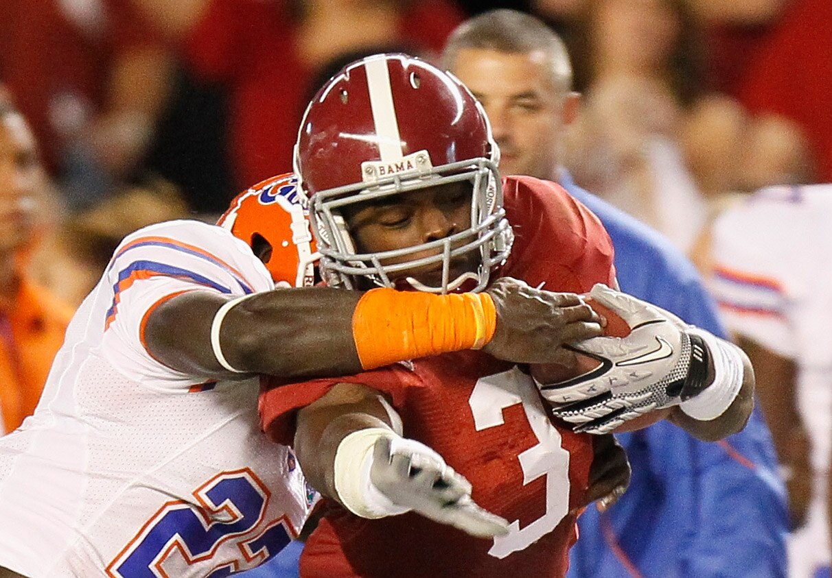 TUSCALOOSA, AL - OCTOBER 02:  Trent Richardson #3 of the Alabama Crimson Tide is tackled by Matt Elam #22 of the Florida Gators at Bryant-Denny Stadium on October 2, 2010 in Tuscaloosa, Alabama.  (Photo by Kevin C. Cox/Getty Images)