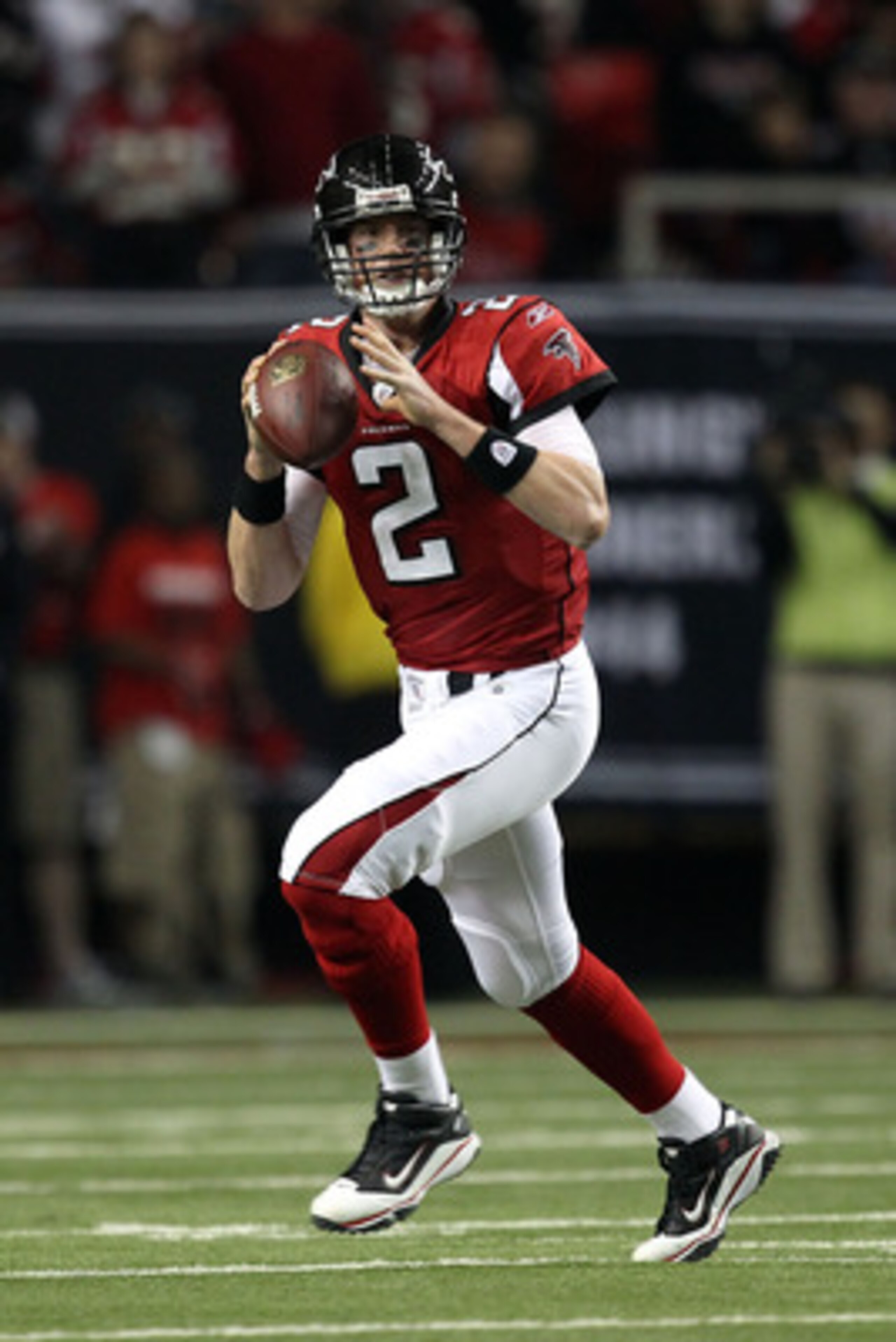 ATLANTA, GA - JANUARY 15: Quarterback Matt Ryan #2 of the Atlanta Falcons rolls out to pass against the Green Bay Packers during their 2011 NFC divisional playoff game at Georgia Dome on January 15, 2011 in Atlanta, Georgia. The Packers won 48-21. (Phot ATLANTA, GA - JANUARY 15: Quarterback Matt Ryan #2 of the Atlanta Falcons rolls out to pass against the Green Bay Packers during their 2011 NFC divisional playoff game at Georgia Dome on January 15, 2011 in Atlanta, Georgia. The Packers won 48-21. (Phot