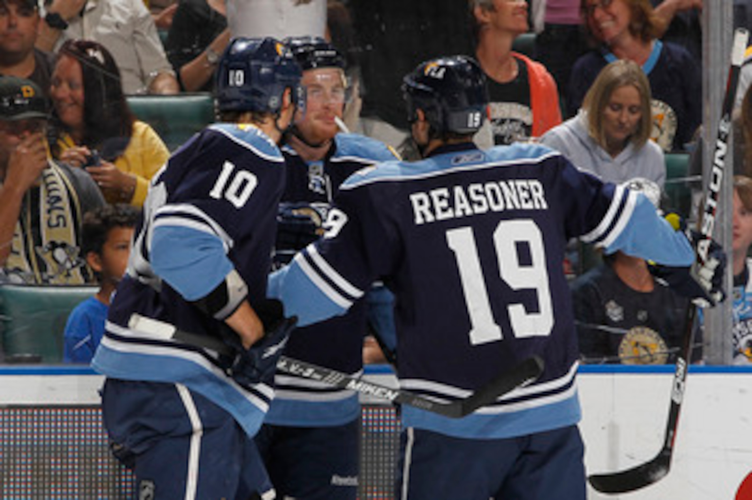 SUNRISE, FL - APRIL 2: Jack Skille #15 is congratulated by David Booth #10 and Marty Reasoner #19 of the Florida Panthers after scoring his first goal as a Panther against the Pittsburgh Penguins on April 2, 2011 at the BankAtlantic Center in Sunrise, Flo