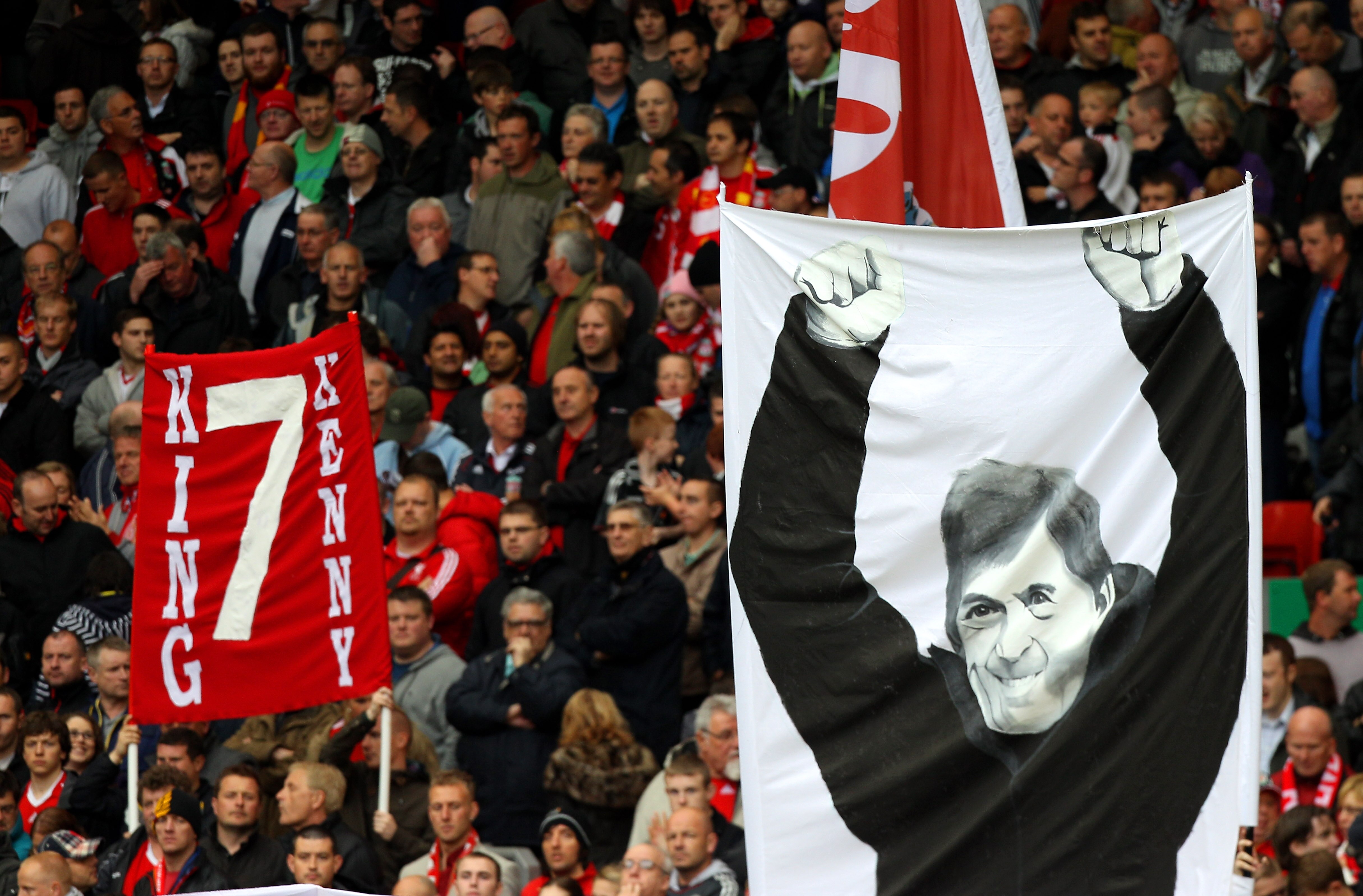 LIVERPOOL, ENGLAND - MAY 15:  Liverpool fans display banners dedicated to former player and now manager, Kenny Dalglish during the Barclays Premier League match between Liverpool and Tottenham Hotspur at Anfield on May 15, 2011 in Liverpool, England.  (Ph