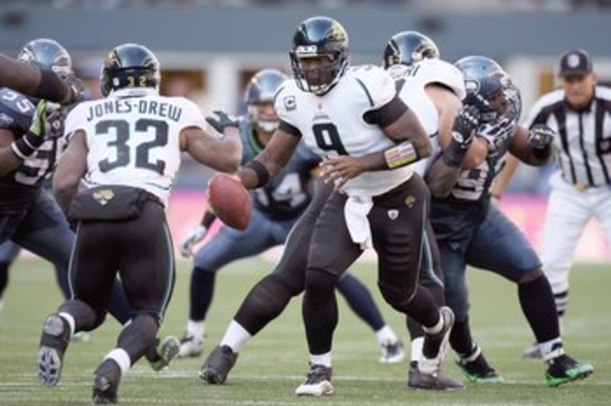 SEATTLE - OCTOBER 11: Quarterback David Gerrard #9 of the Jacksonville Jaguars hands off the ball to Maurice Jones -Drew #32 during the game against the Seattle Seahawks on October 11, 2009 at Qwest Field in Seattle, Washington. The Seahawks defeated the SEATTLE - OCTOBER 11: Quarterback David Gerrard #9 of the Jacksonville Jaguars hands off the ball to Maurice Jones -Drew #32 during the game against the Seattle Seahawks on October 11, 2009 at Qwest Field in Seattle, Washington. The Seahawks defeated the