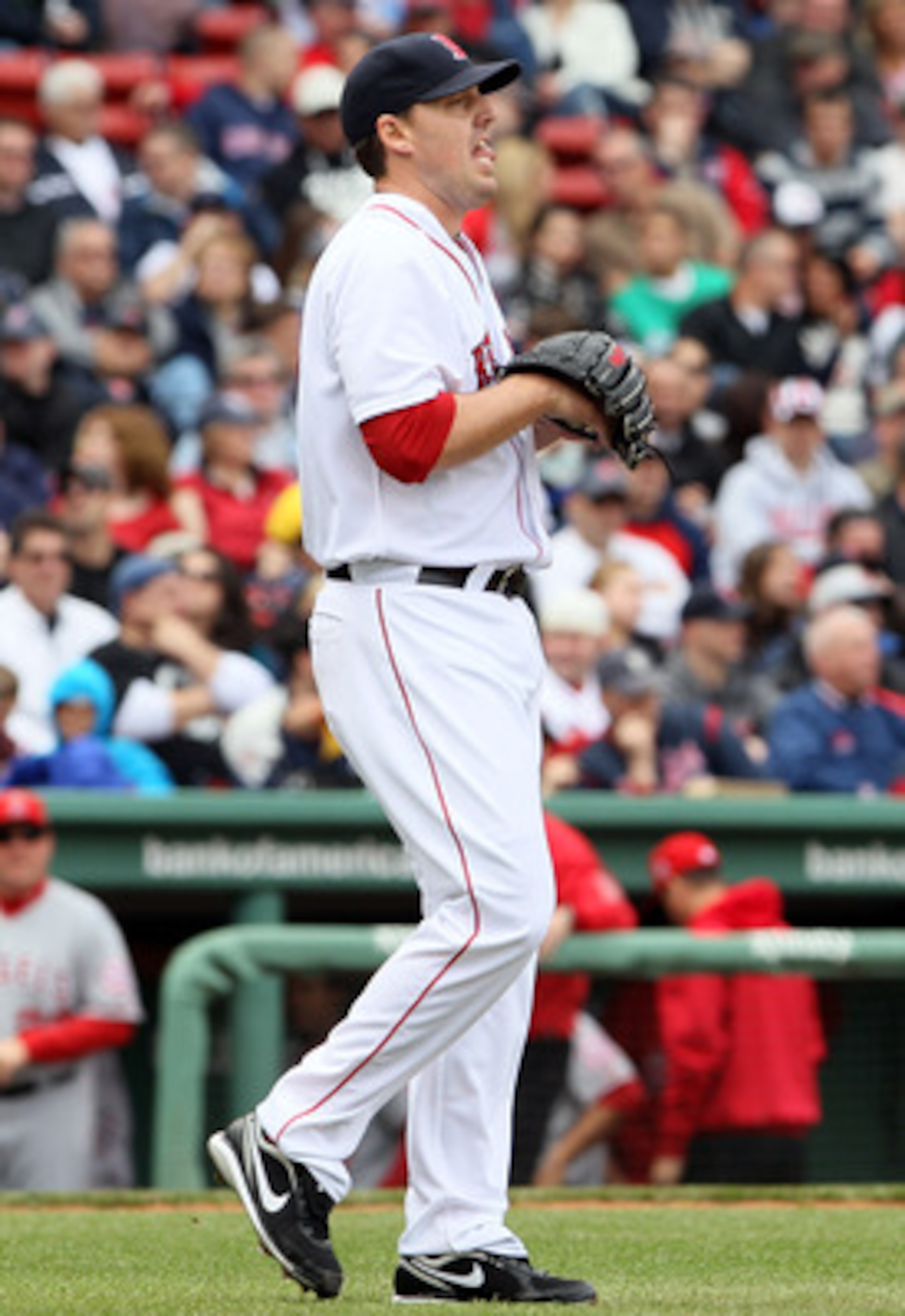 BOSTON, MA - MAY 05: John Lackey #41 of the Boston Red Sox heads back to the mound after Erick Aybar and Torii Hunter of the Los Angeles Angels scored in the third inning on May 5, 2011 at Fenway Park in Boston, Massachusetts. (Photo by Elsa/Getty Image BOSTON, MA - MAY 05: John Lackey #41 of the Boston Red Sox heads back to the mound after Erick Aybar and Torii Hunter of the Los Angeles Angels scored in the third inning on May 5, 2011 at Fenway Park in Boston, Massachusetts. (Photo by Elsa/Getty Image