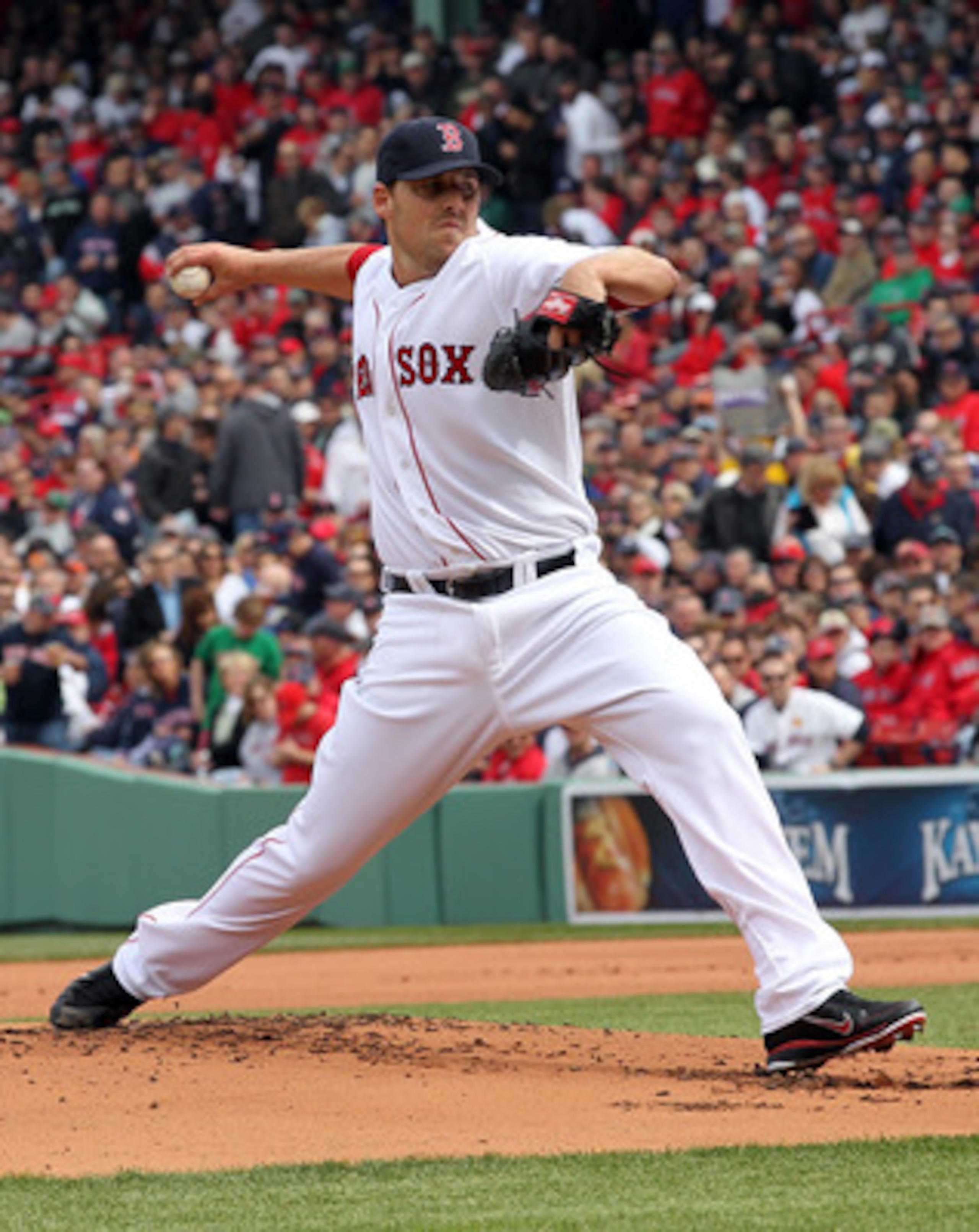 BOSTON, MA - APRIL 8: John Lackey #42 of the Boston Red Sox throws against the New York Yankees in the first inning on Opening Day at Fenway Park on April 8, 2011 in Boston, Massachusetts. (Photo by Jim Rogash/Getty Images) BOSTON, MA - APRIL 8: John Lackey #42 of the Boston Red Sox throws against the New York Yankees in the first inning on Opening Day at Fenway Park on April 8, 2011 in Boston, Massachusetts. (Photo by Jim Rogash/Getty Images)