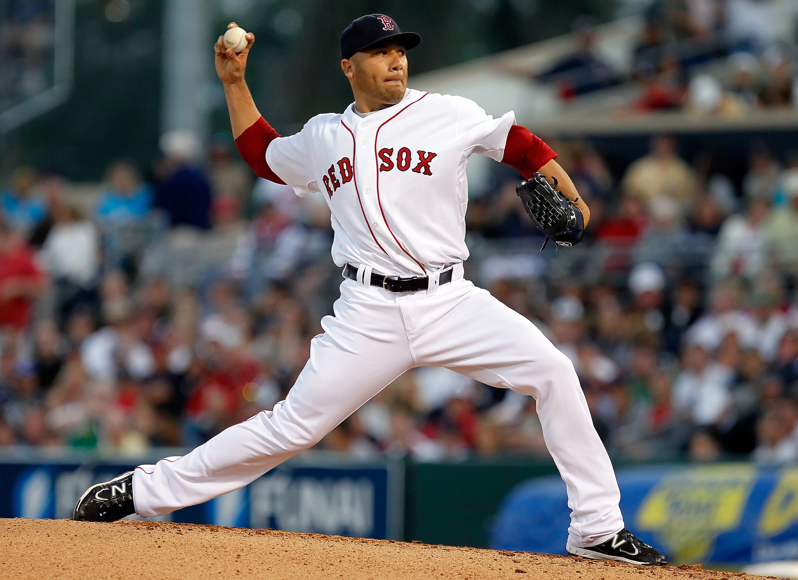 FORT MYERS, FL - MARCH 14: Pitcher Alfredo Aceves #91 of the Boston Red Sox pitches against the New York Yankees during a Grapefruit League Spring Training Game at City of Palms Park on March 14, 2011 in Fort Myers, Florida. (Photo by J. Meric/Getty Ima FORT MYERS, FL - MARCH 14: Pitcher Alfredo Aceves #91 of the Boston Red Sox pitches against the New York Yankees during a Grapefruit League Spring Training Game at City of Palms Park on March 14, 2011 in Fort Myers, Florida. (Photo by J. Meric/Getty Ima