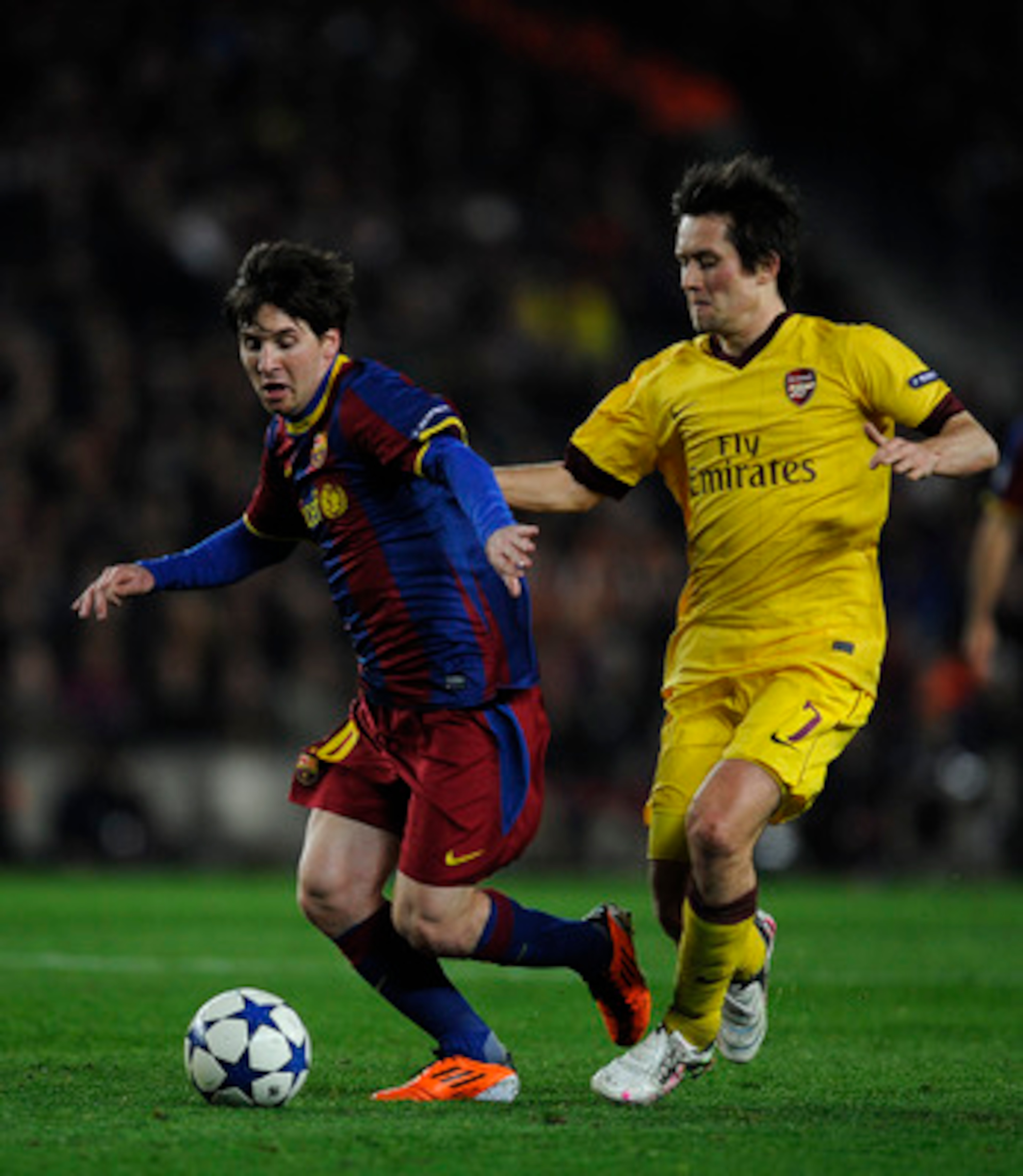 BARCELONA, SPAIN - MARCH 08: Lionel Messi of FC Barcelona (L) duels for the ball against Tomas Rosicky of Arsenal during the UEFA Champions League round of 16 second leg match between Barcelona and Arsenal at the Camp Nou stadium on March 8, 2011 in Barc BARCELONA, SPAIN - MARCH 08: Lionel Messi of FC Barcelona (L) duels for the ball against Tomas Rosicky of Arsenal during the UEFA Champions League round of 16 second leg match between Barcelona and Arsenal at the Camp Nou stadium on March 8, 2011 in Barc