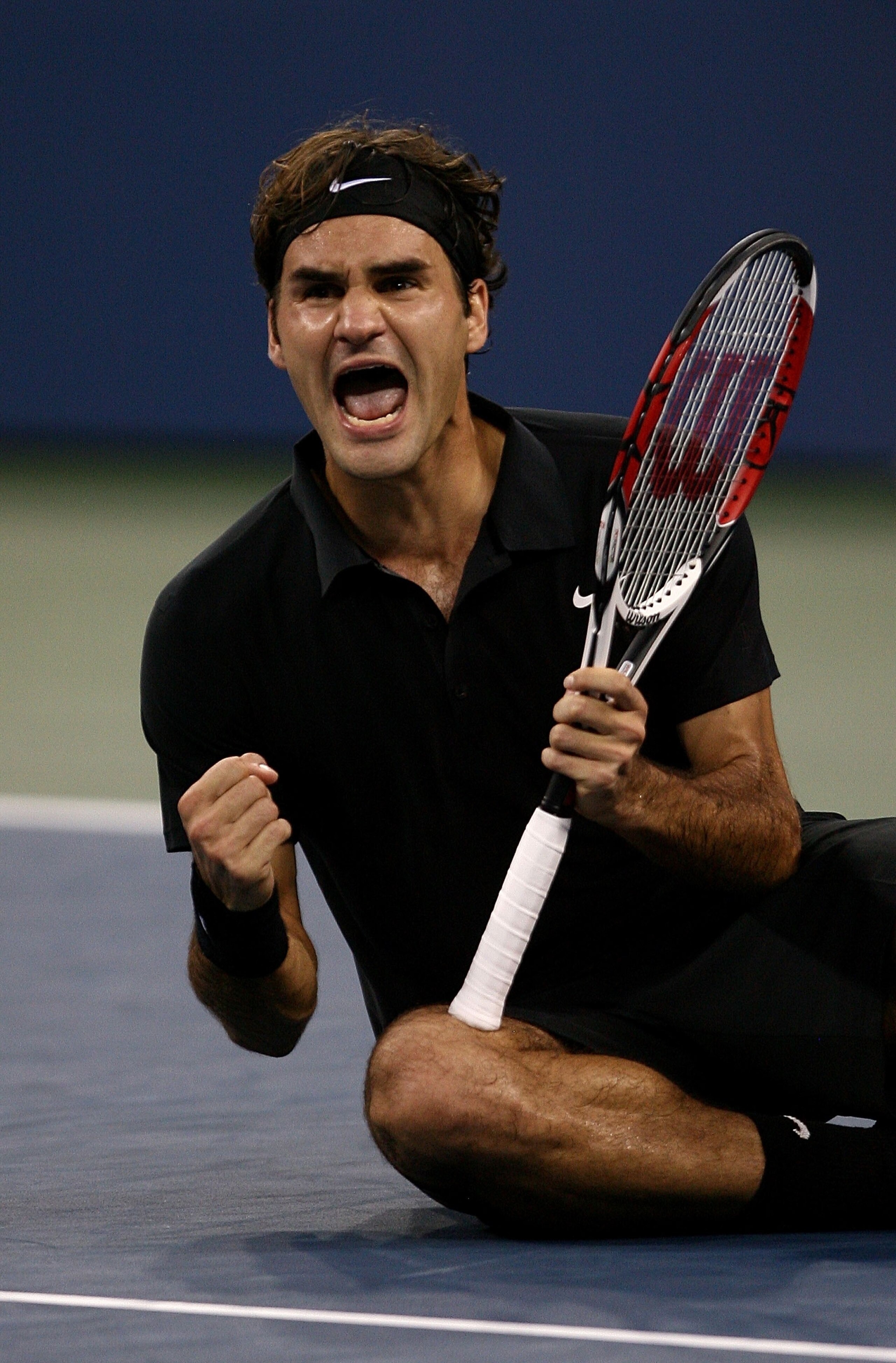 NEW YORK - SEPTEMBER 09:  Roger Federer of Switzerland celebrates after defeating Novak Djokovic of Serbia by a score of 7-6(4), 7-6(2), 6-4 to win the Men's Singles Final on day fourteen of the 2007 U.S. Open in Arthur Ashe Stadium at the Billie Jean Kin
