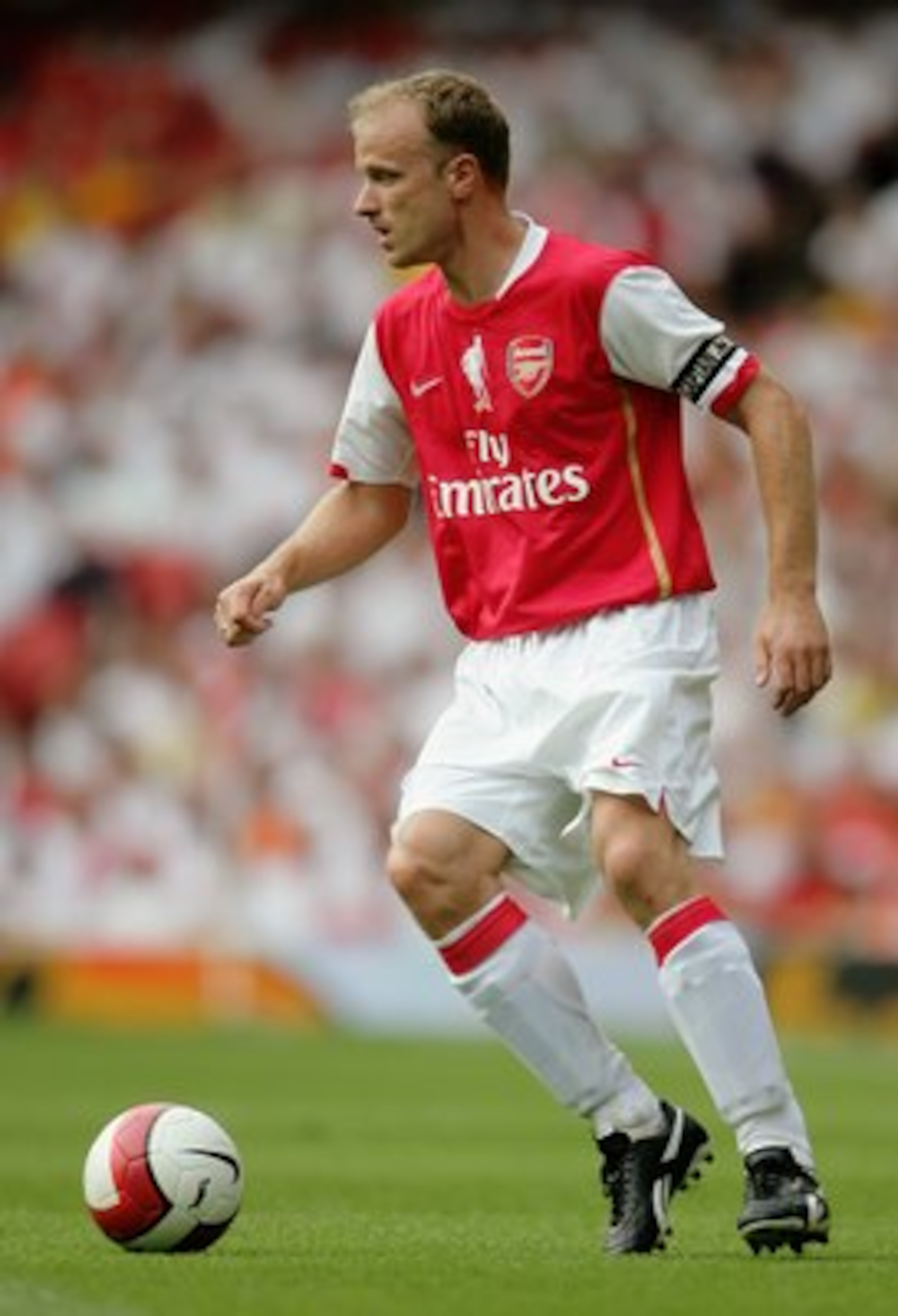 LONDON - JULY 22: Dennis Bergkamp of Arsenal runs with the ball during the Dennis Bergkamp testimonial match between Arsenal and Ajax at the Emirates Stadium on July 22, 2006 in London, England. (Photo by Jamie McDonald/Getty Images) LONDON - JULY 22: Dennis Bergkamp of Arsenal runs with the ball during the Dennis Bergkamp testimonial match between Arsenal and Ajax at the Emirates Stadium on July 22, 2006 in London, England. (Photo by Jamie McDonald/Getty Images)