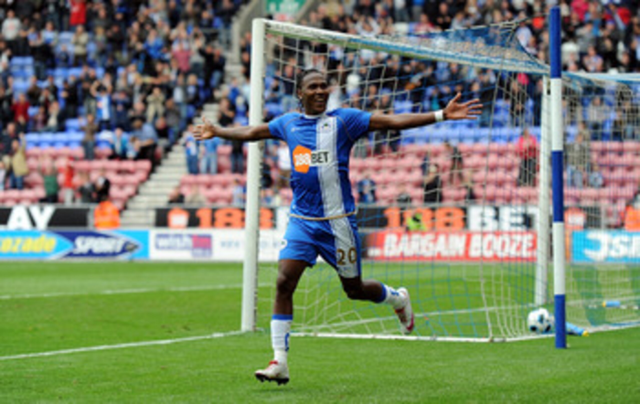 WIGAN, ENGLAND - OCTOBER 02: Hugo Rodallega of Wigan Athletic celebrates scoring his side's second goal during the Barclays Premier League match between Wigan Athletic and Wolverhampton Wanderers at DW Stadium on October 2, 2010 in Wigan, England.  (Photo