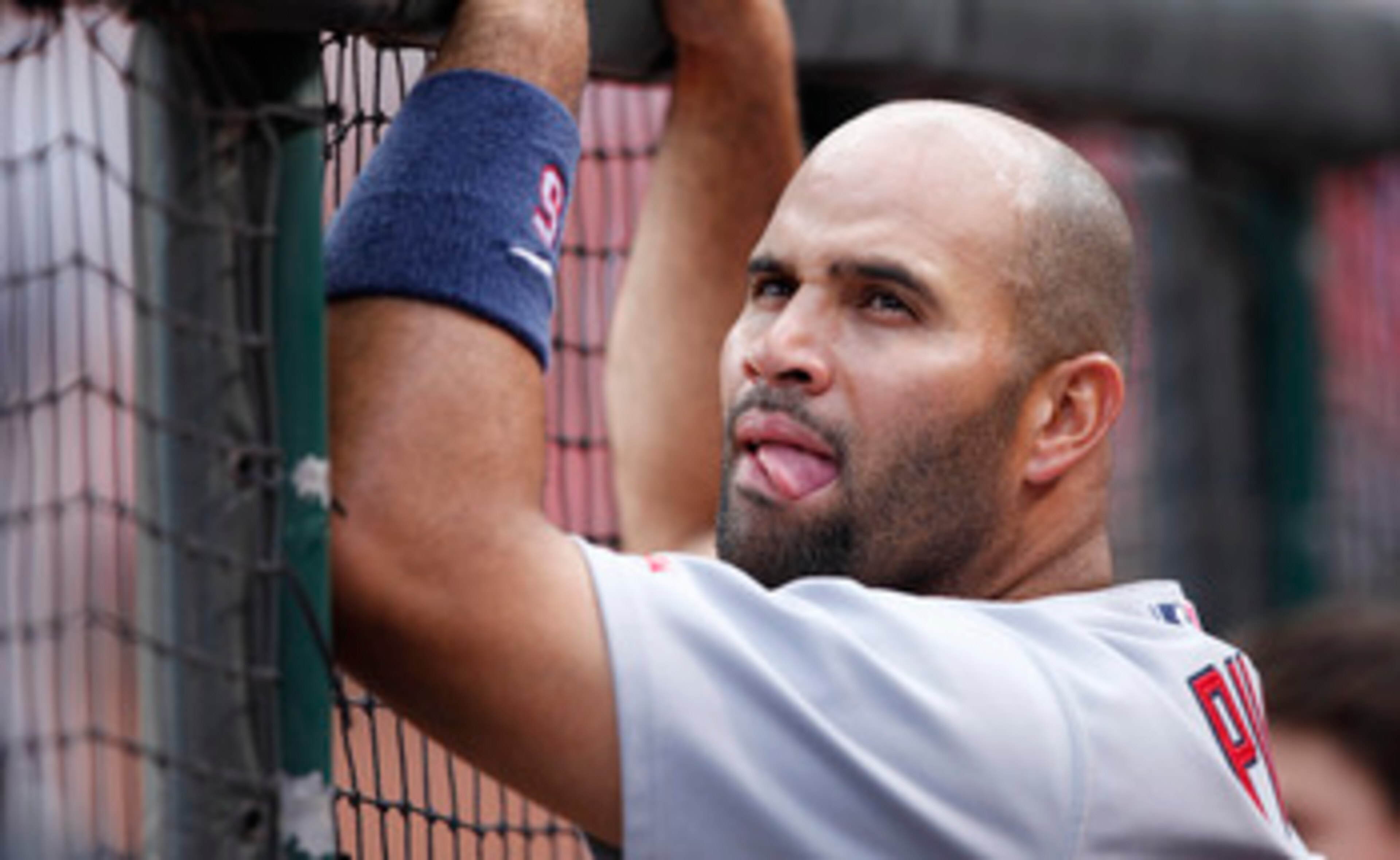 CINCINNATI, OH - MAY 14: Albert Pujols #5 of the St. Louis Cardinals looks on late in the game against the Cincinnati Reds at Great American Ball Park on May 14, 2011 in Cincinnati, Ohio. The Reds defeated the Cardinals 7-3. (Photo by Joe Robbins/Getty Im CINCINNATI, OH - MAY 14: Albert Pujols #5 of the St. Louis Cardinals looks on late in the game against the Cincinnati Reds at Great American Ball Park on May 14, 2011 in Cincinnati, Ohio. The Reds defeated the Cardinals 7-3. (Photo by Joe Robbins/Getty Im