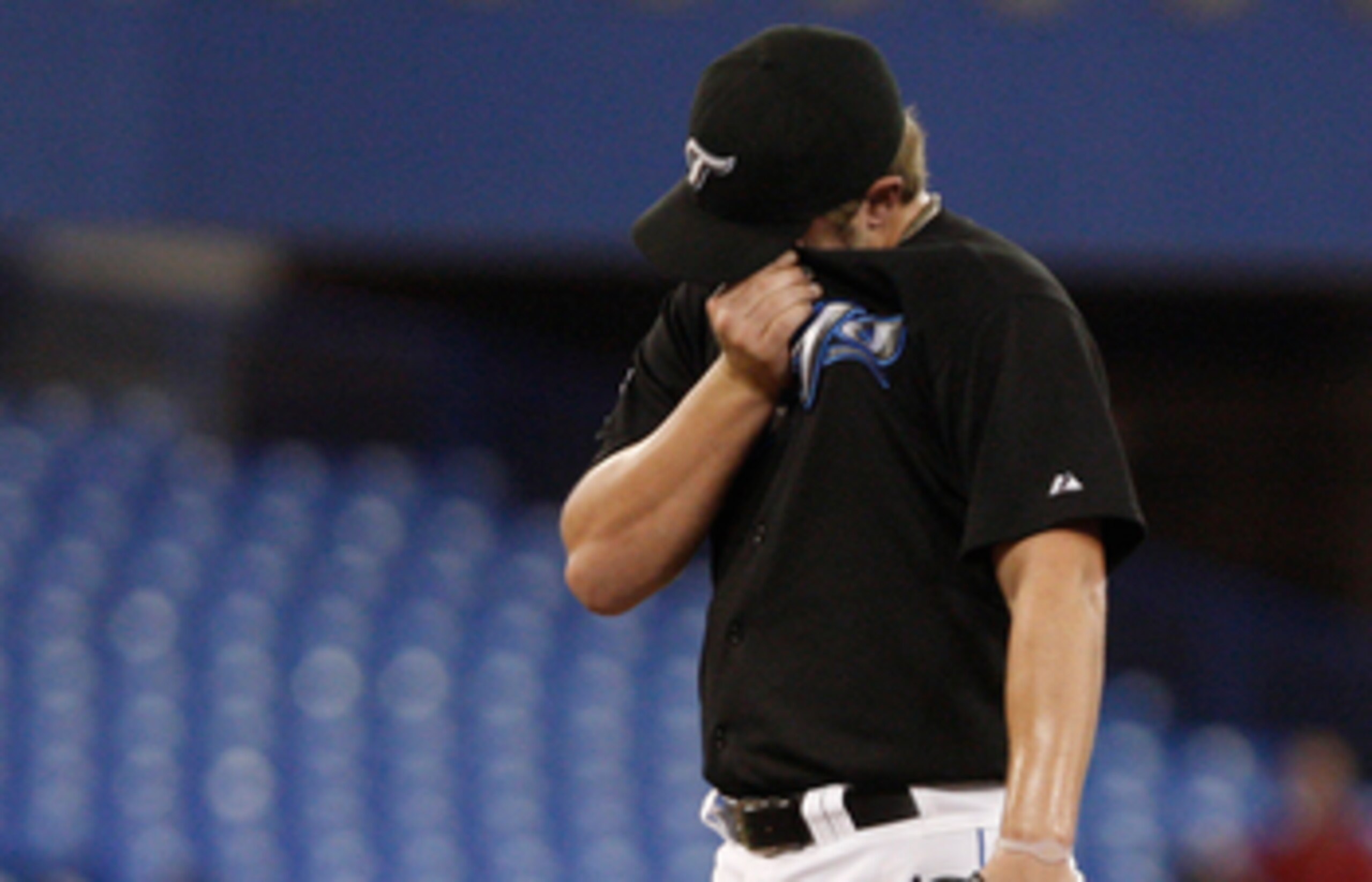 TORONTO, ON - SEPTEMBER 28: Kyle Drabek #4 of the Toronto Blue Jays regroups after a run scores against the New York Yankees during an MLB game at the Rogers Centre September 28, 2010 in Toronto, Ontario, Canada. (Photo by Abelimages/Getty Images)