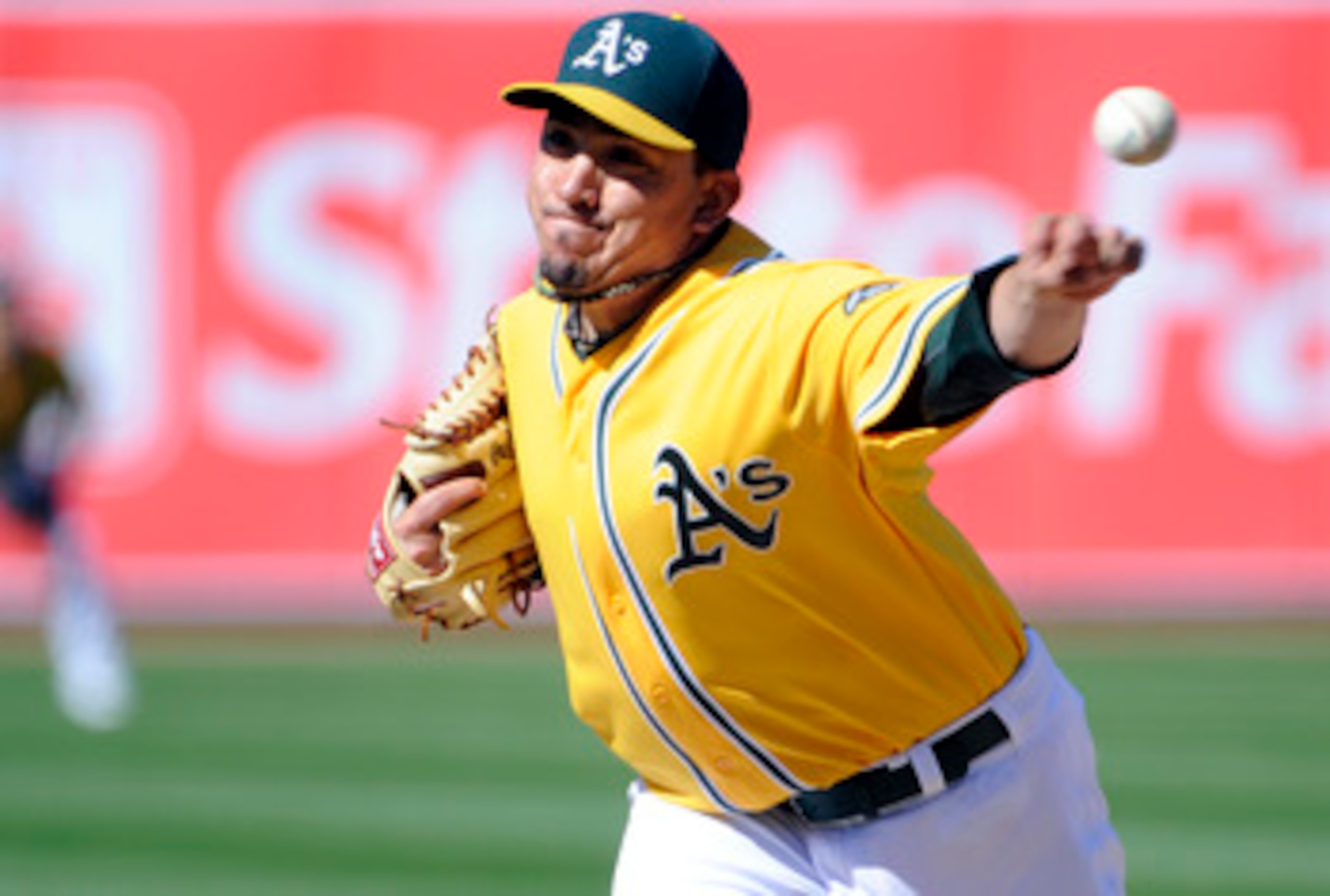 OAKLAND, CA - MAY 1: Brian Fuentes #57 of the Oakland Athletics pitches in the ninth inning against the Texas Rangers during a MLB baseball game at the Oakland-Alameda County Coliseum May 1, 2011 in Oakland, California. The Athletics won the game 7-2. (Ph