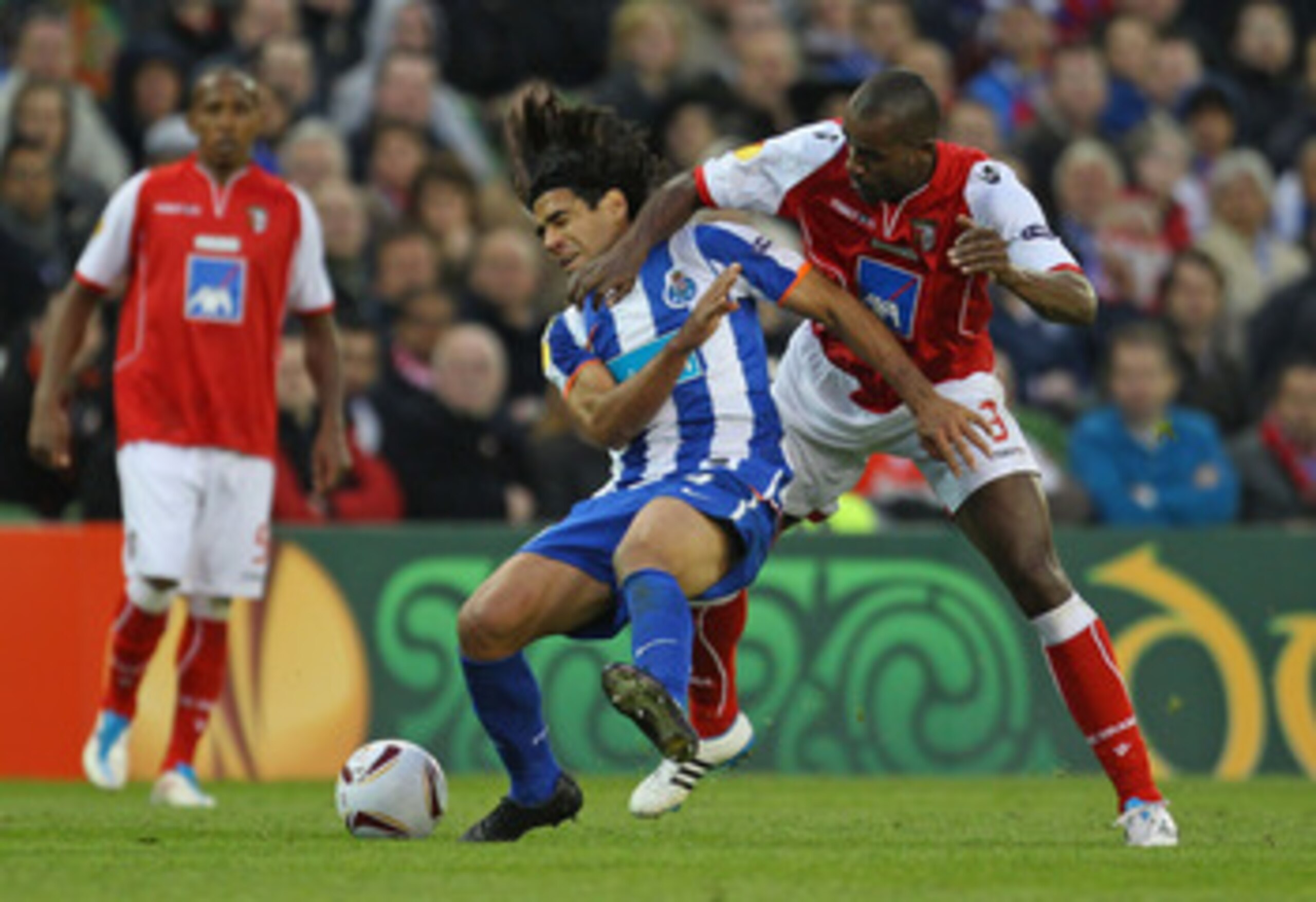 DUBLIN, IRELAND - MAY 18: Paulao  of SC Braga clashes with Radamel Falcao Garcia of FC Porto during the UEFA Europa League Final between FC Porto and SC Braga at Dublin Arena on May 18, 2011 in Dublin, Ireland.  (Photo by Alex Livesey/Getty Images)