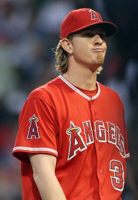 BOSTON, MA - MAY 02:  Jered Weaver #36 of the Los Angeles Angels heads back to the dugout after the first inning against the Boston Red Sox on May 2, 2011 at Fenway Park in Boston, Massachusetts.  (Photo by Elsa/Getty Images)