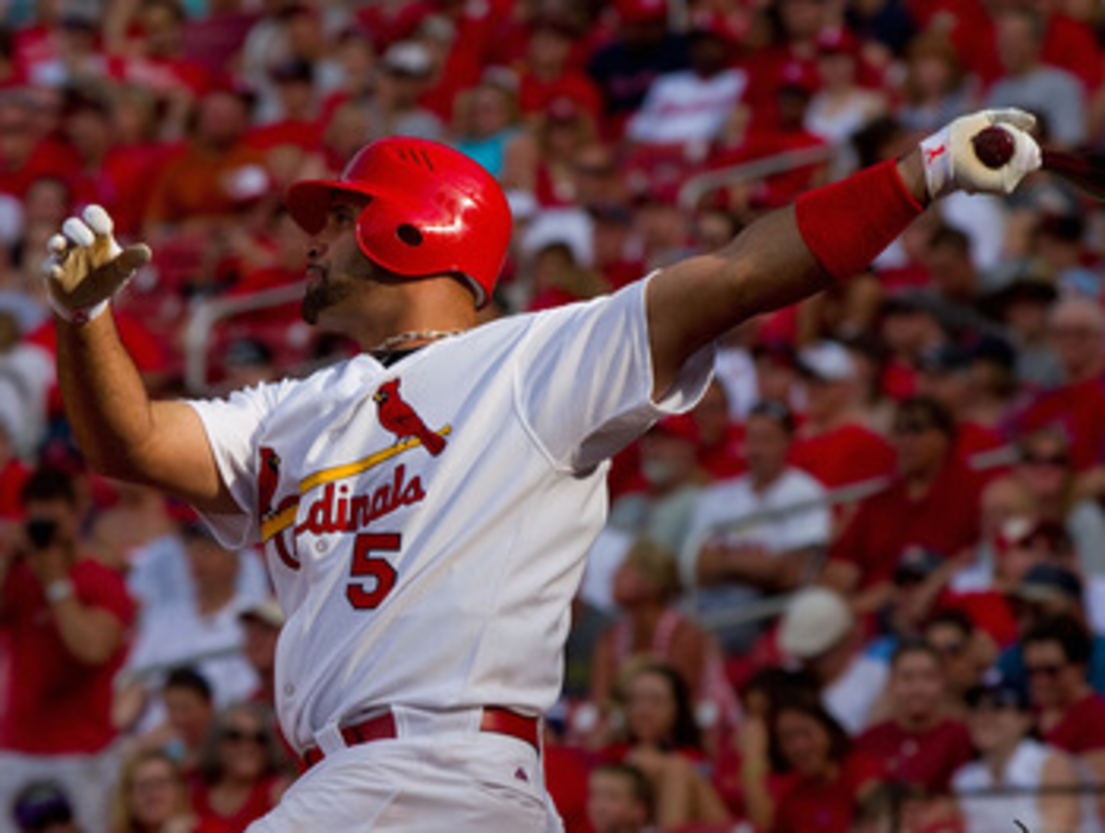 ST. LOUIS, MO - MAY 30: Albert Pujols #5 of the St. Louis Cardinals hits a solo home run against the San Francisco Giants at Busch Stadium on May 30, 2011 in St. Louis, Missouri. (Photo by Dilip Vishwanat/Getty Images) ST. LOUIS, MO - MAY 30: Albert Pujols #5 of the St. Louis Cardinals hits a solo home run against the San Francisco Giants at Busch Stadium on May 30, 2011 in St. Louis, Missouri. (Photo by Dilip Vishwanat/Getty Images)