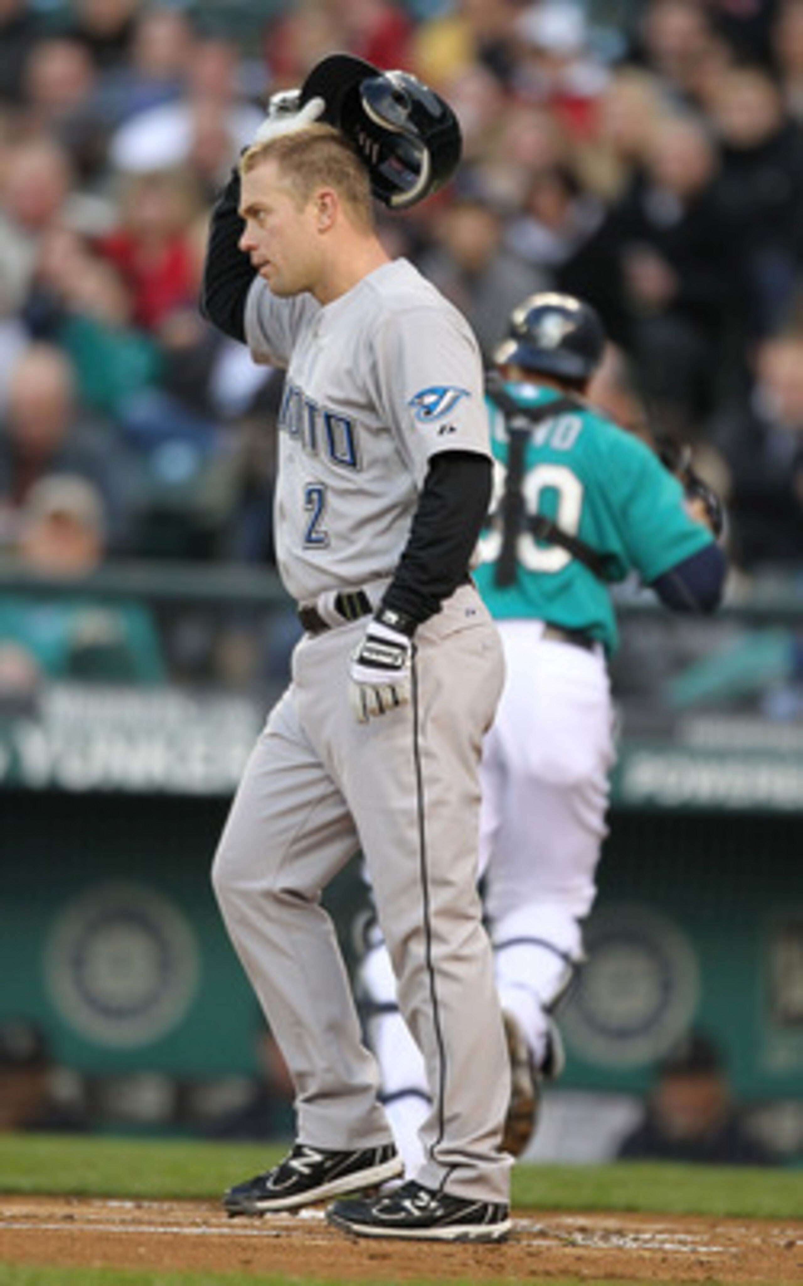 SEATTLE - APRIL 11:  Aaron Hill #2 of the Toronto Blue Jays is called out on strikes in the first inning against the Seattle Mariners at Safeco Field on April 11, 2011 in Seattle, Washington. (Photo by Otto Greule Jr/Getty Images)
